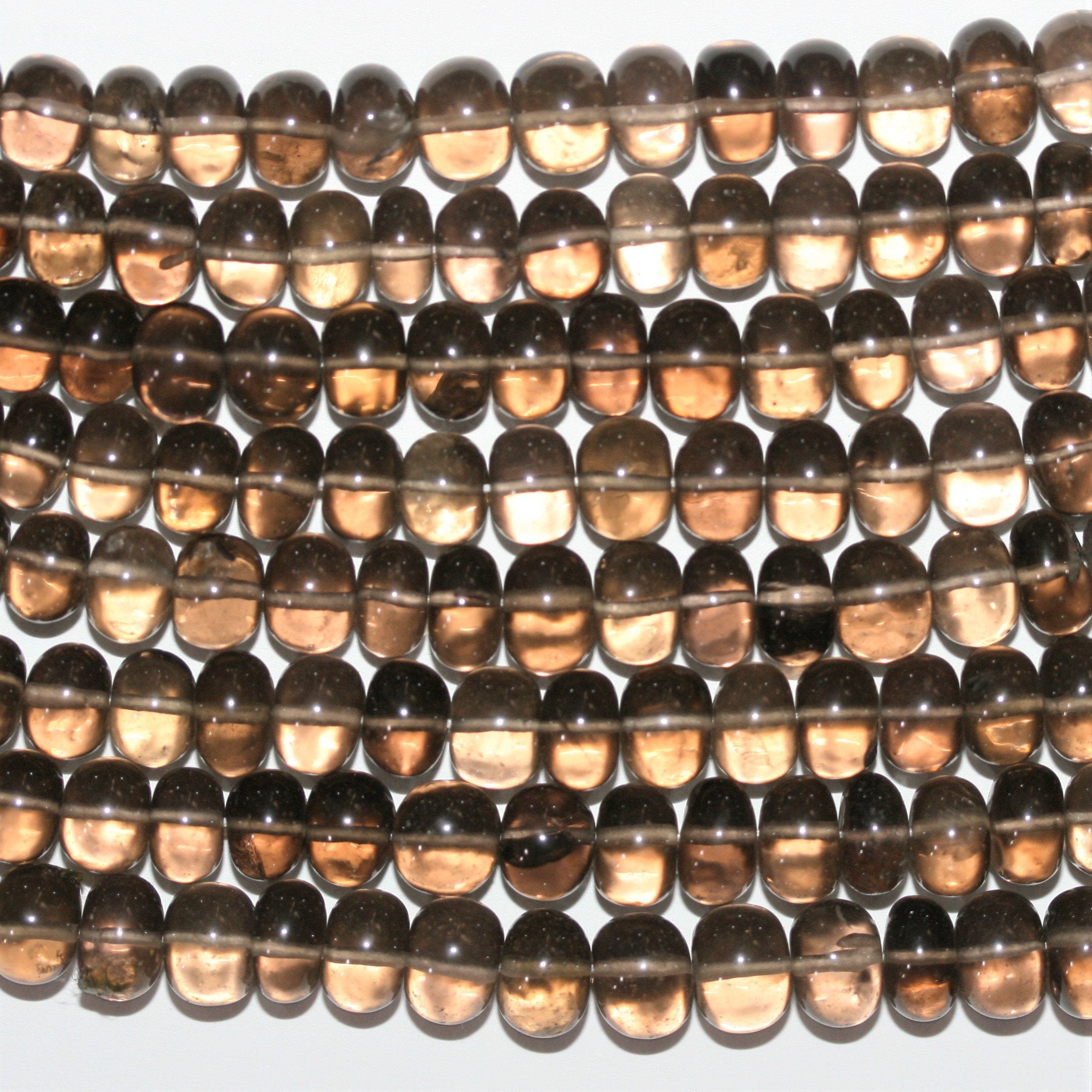 Cuentas redondas lisas graduadas de cuarzo ahumado de 18" de 6 x 5-9 x 6 mm, hilo de 46 cm.