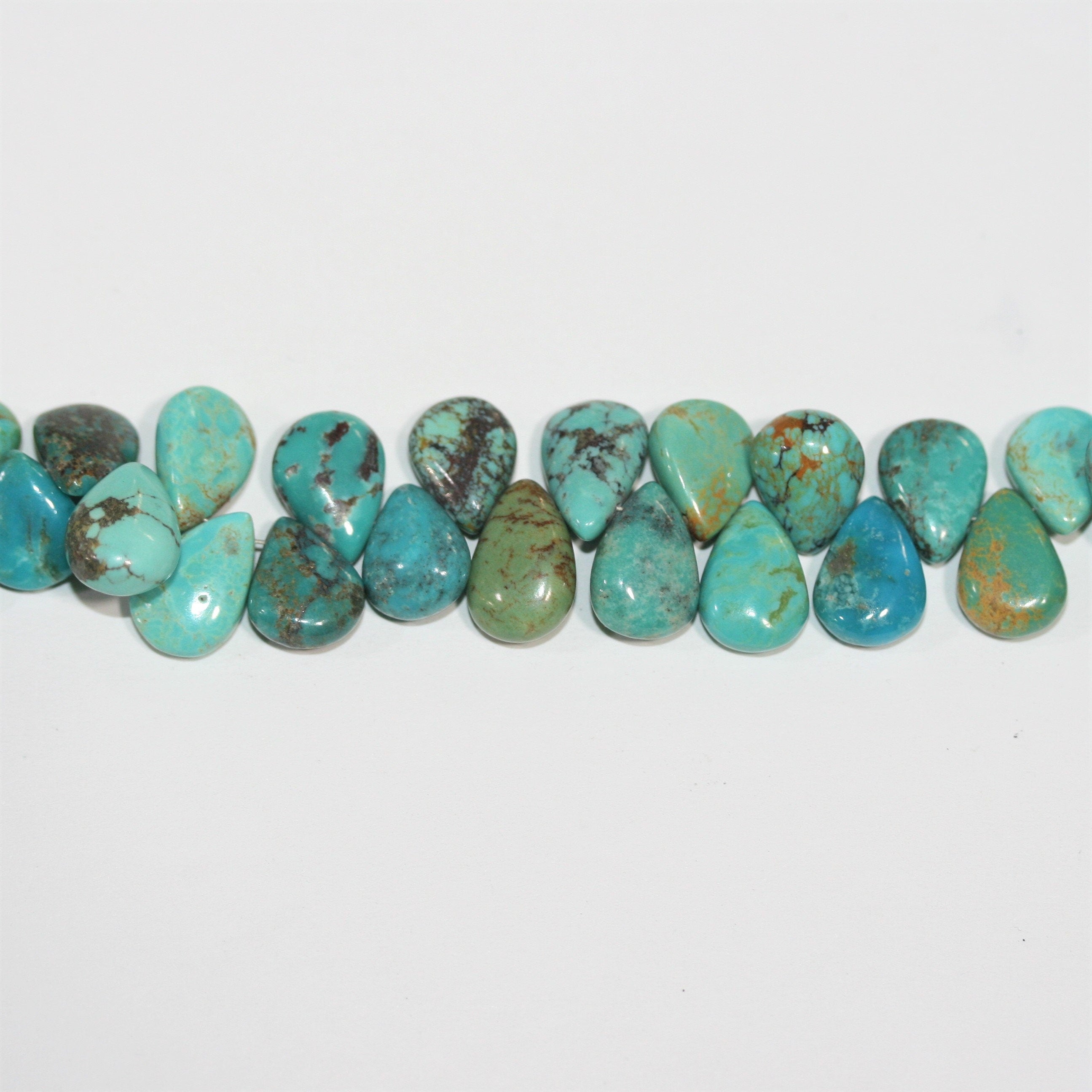 Cuentas lisas de turquesa de 7" St. 10 x 8 mm. Aprox. - Hilo de 19 cm.