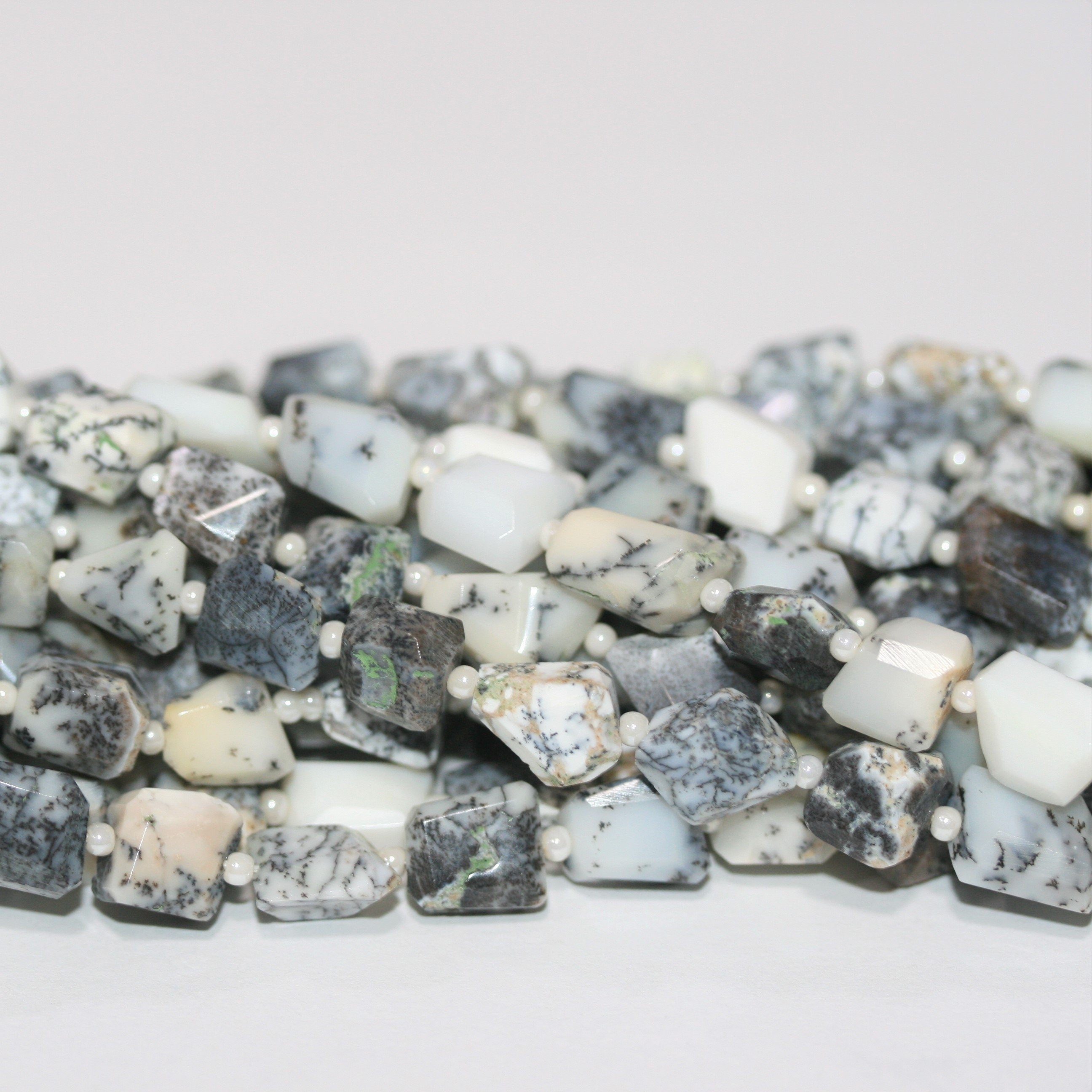 14" St Dendritic Opal Faceted Nugget 8x6mm. approx. Strand 35cm.