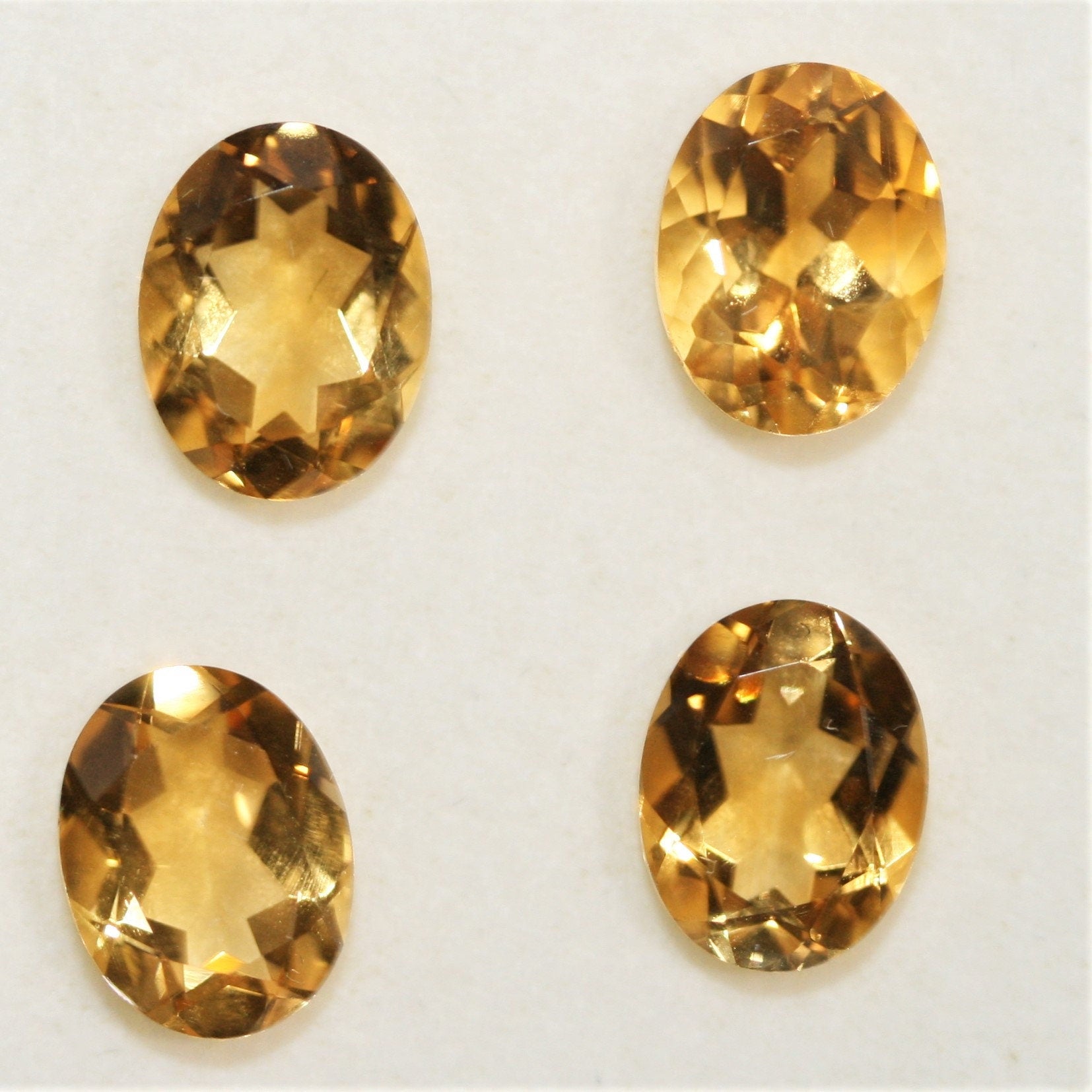 Lote de 4 piezas de citrino facetado ovalado de 9x7 mm. (4 piezas).