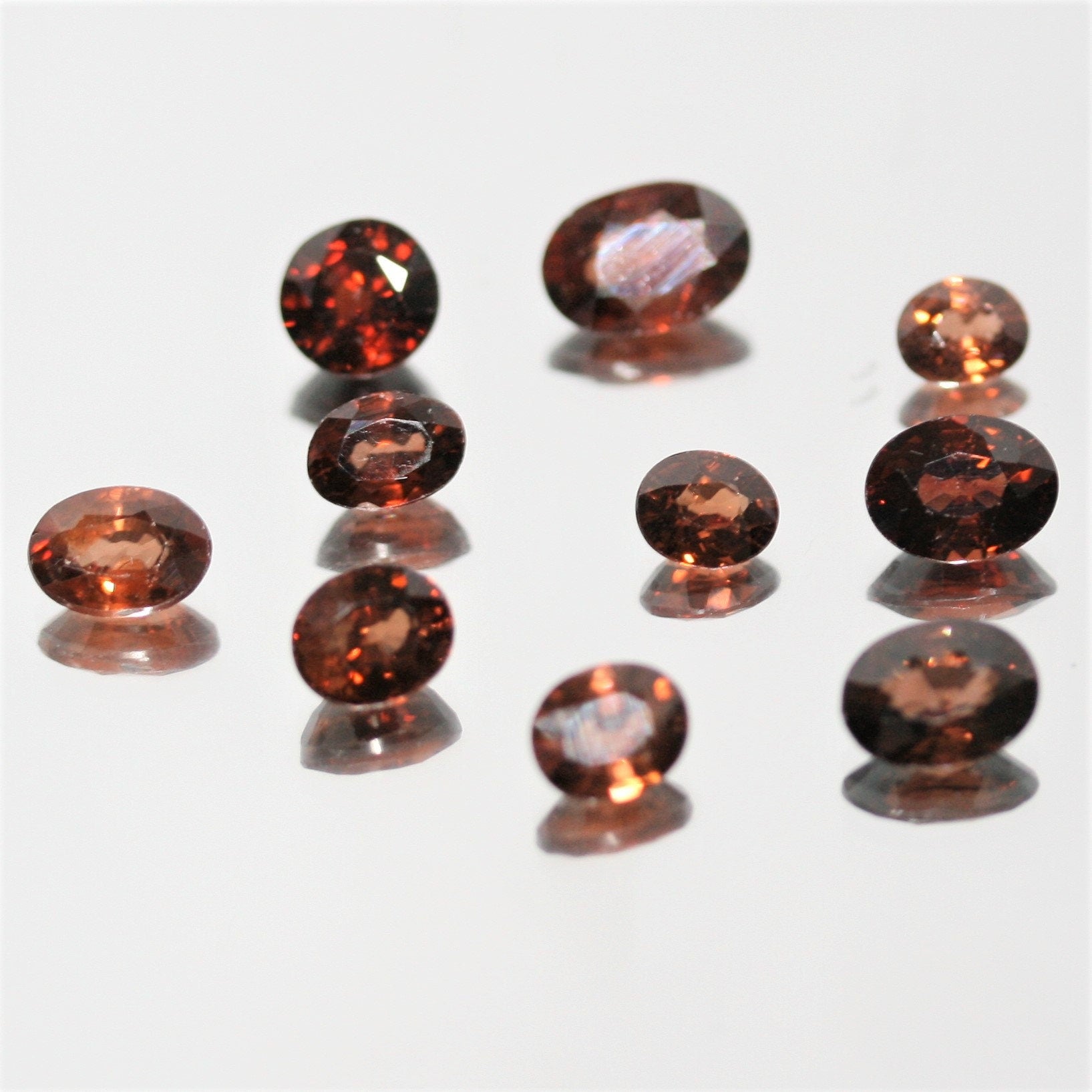 10 Pcs Lot Brown Zircon Faceted Oval 5.2x4.4 - 7.8x5.5 (10.2 ct.).- Ref: 050LO