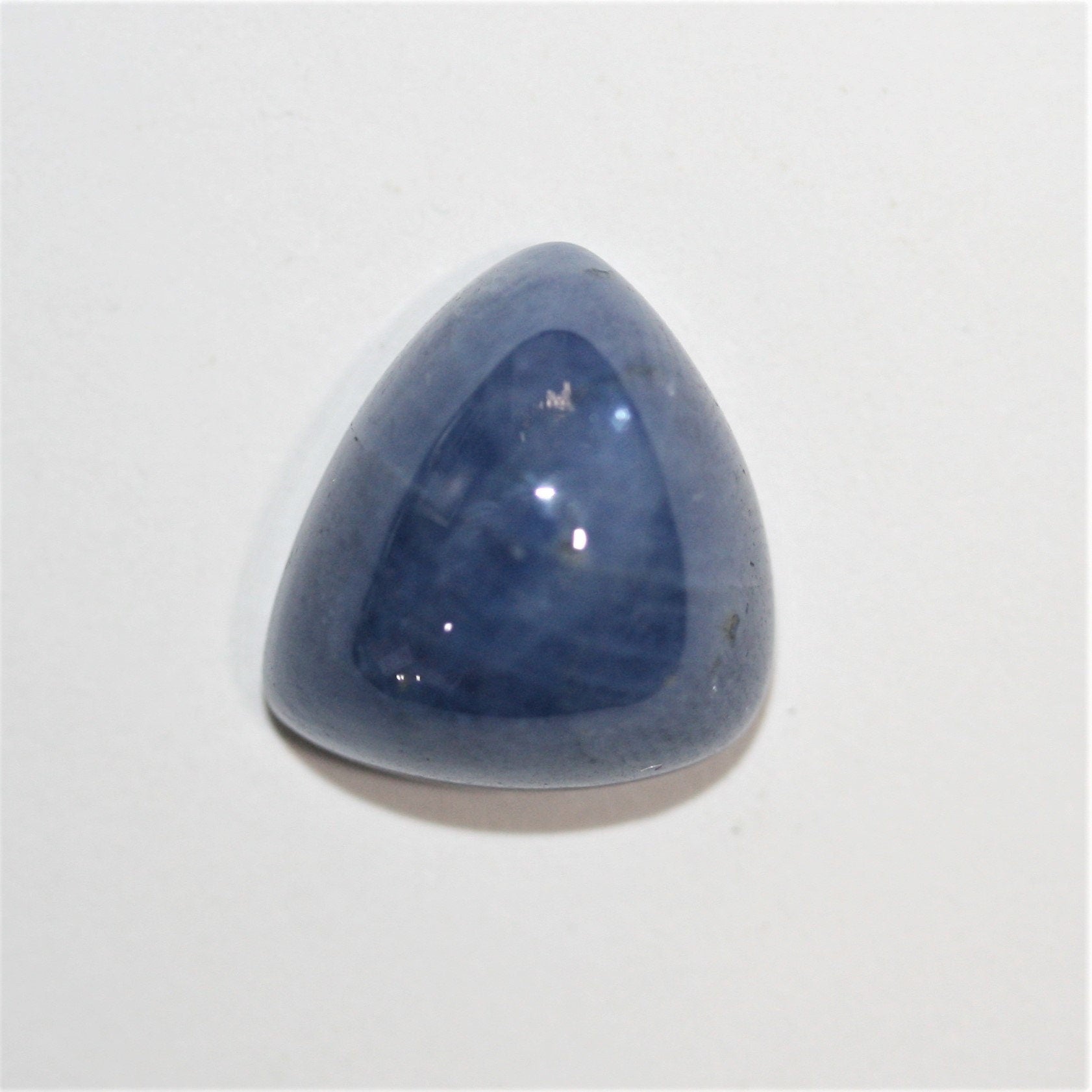 Sapphire Smooth Trillion Cabochon 13mm. (12 ct.)
