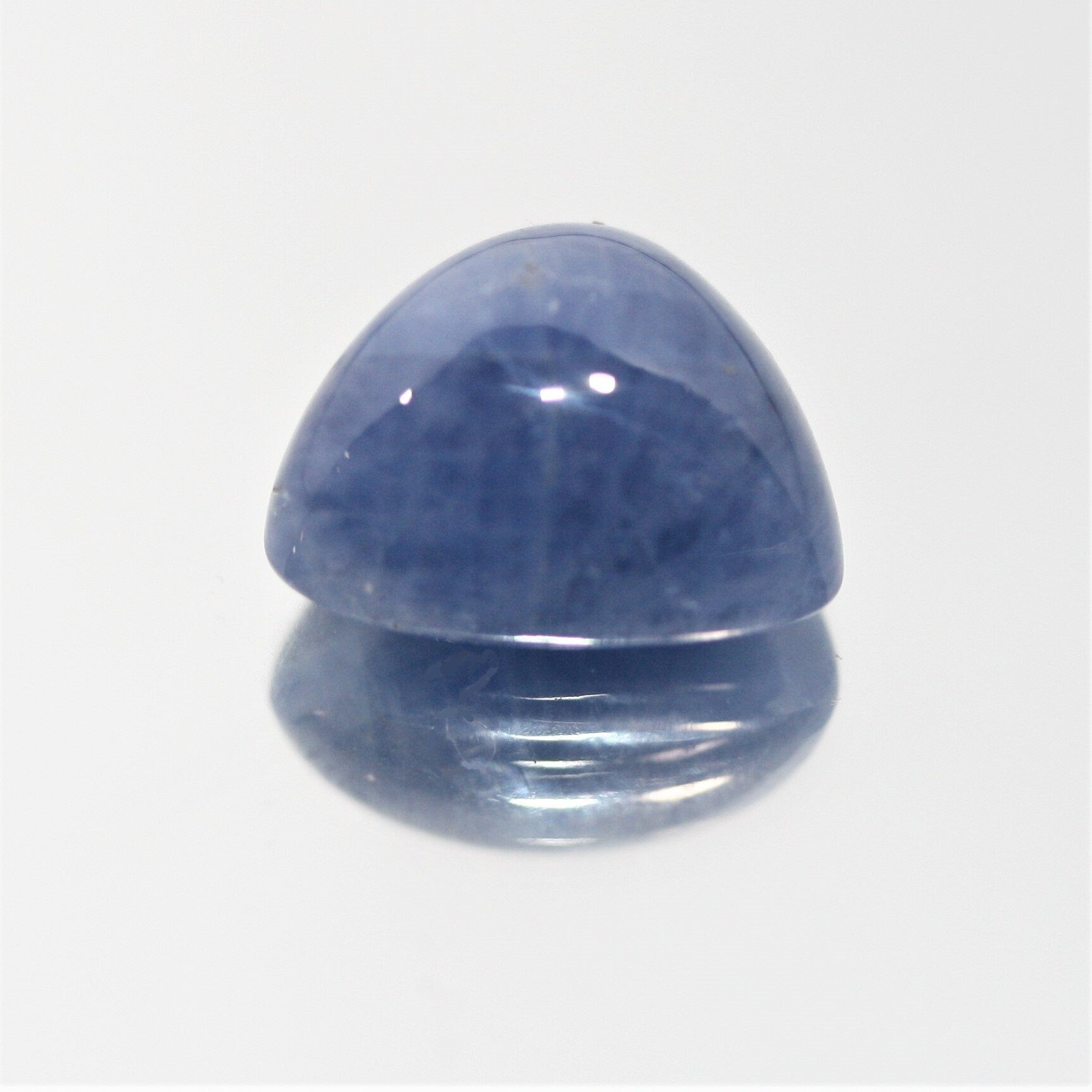 Sapphire Smooth Trillion Cabochon 13mm. (12 ct.)