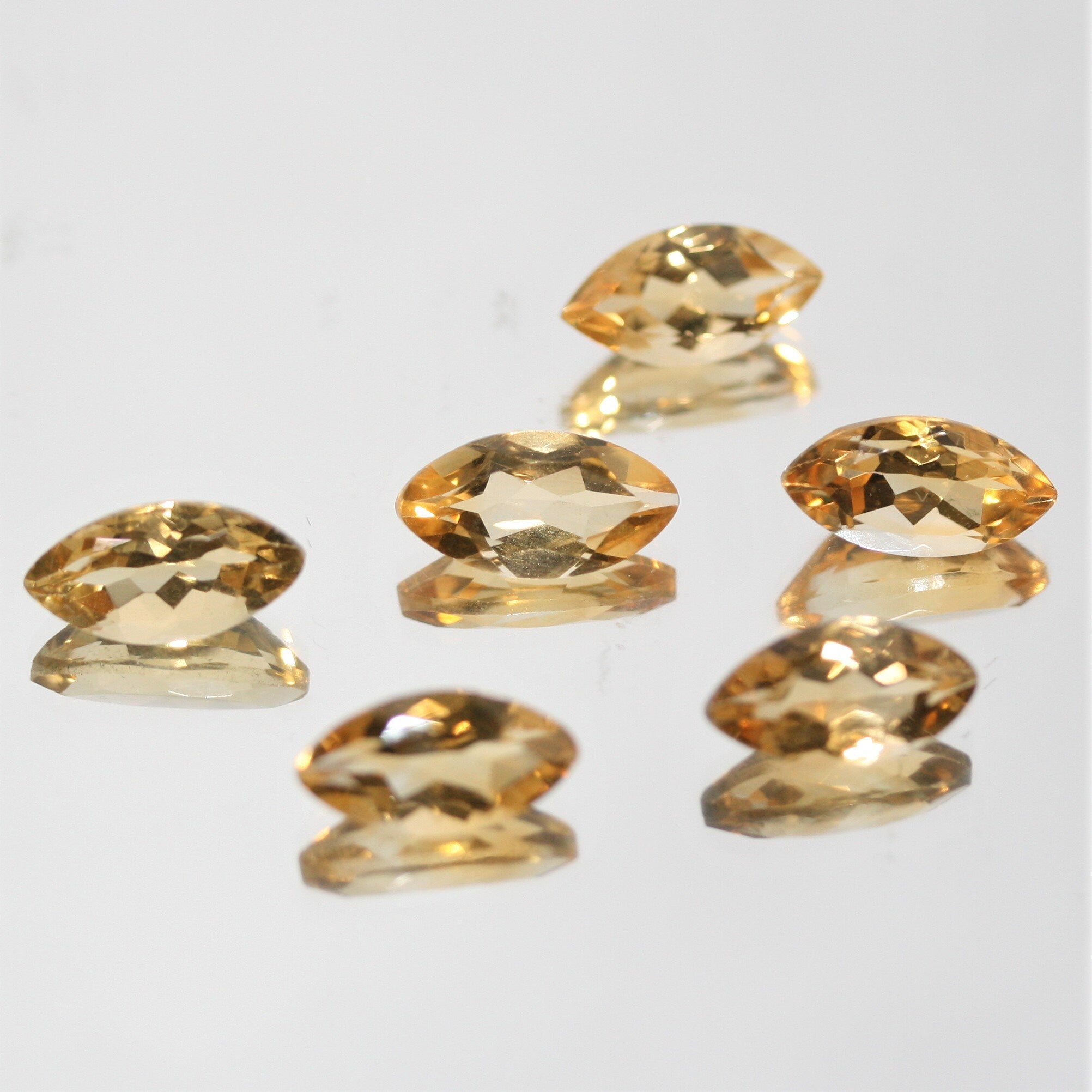 Lote de 6 piezas de citrino facetado marquesa de 12 x 6 mm. (6 piezas)