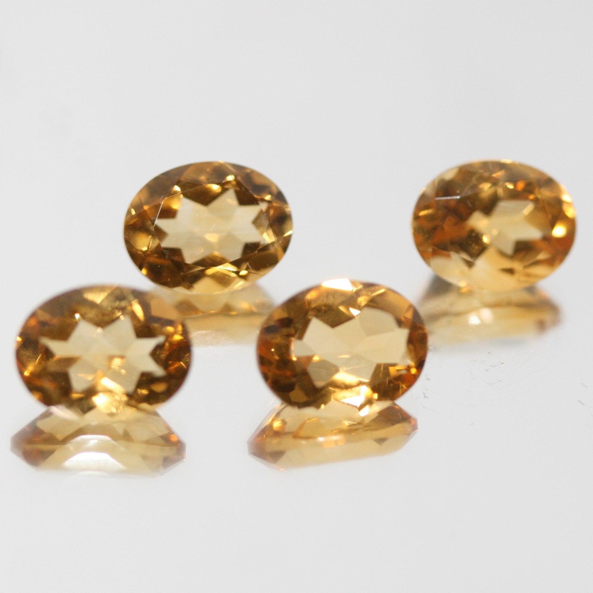 Lote de 4 piezas de citrino facetado ovalado de 9x7 mm. (4 piezas).