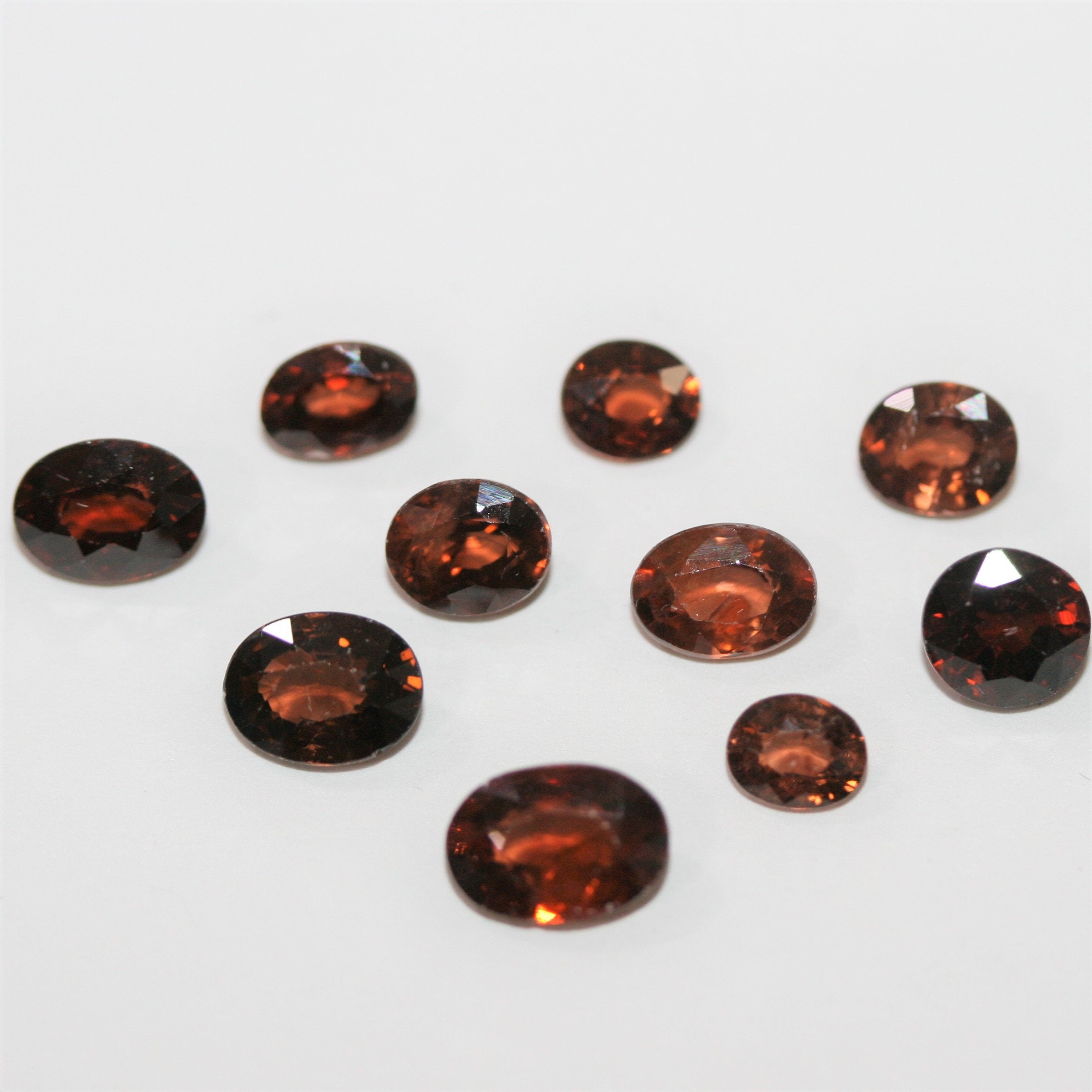 10 Pcs Lot Brown Zircon Faceted Oval 5.2x4.4 - 7.8x5.5 (10.2 ct.).- Ref: 050LO
