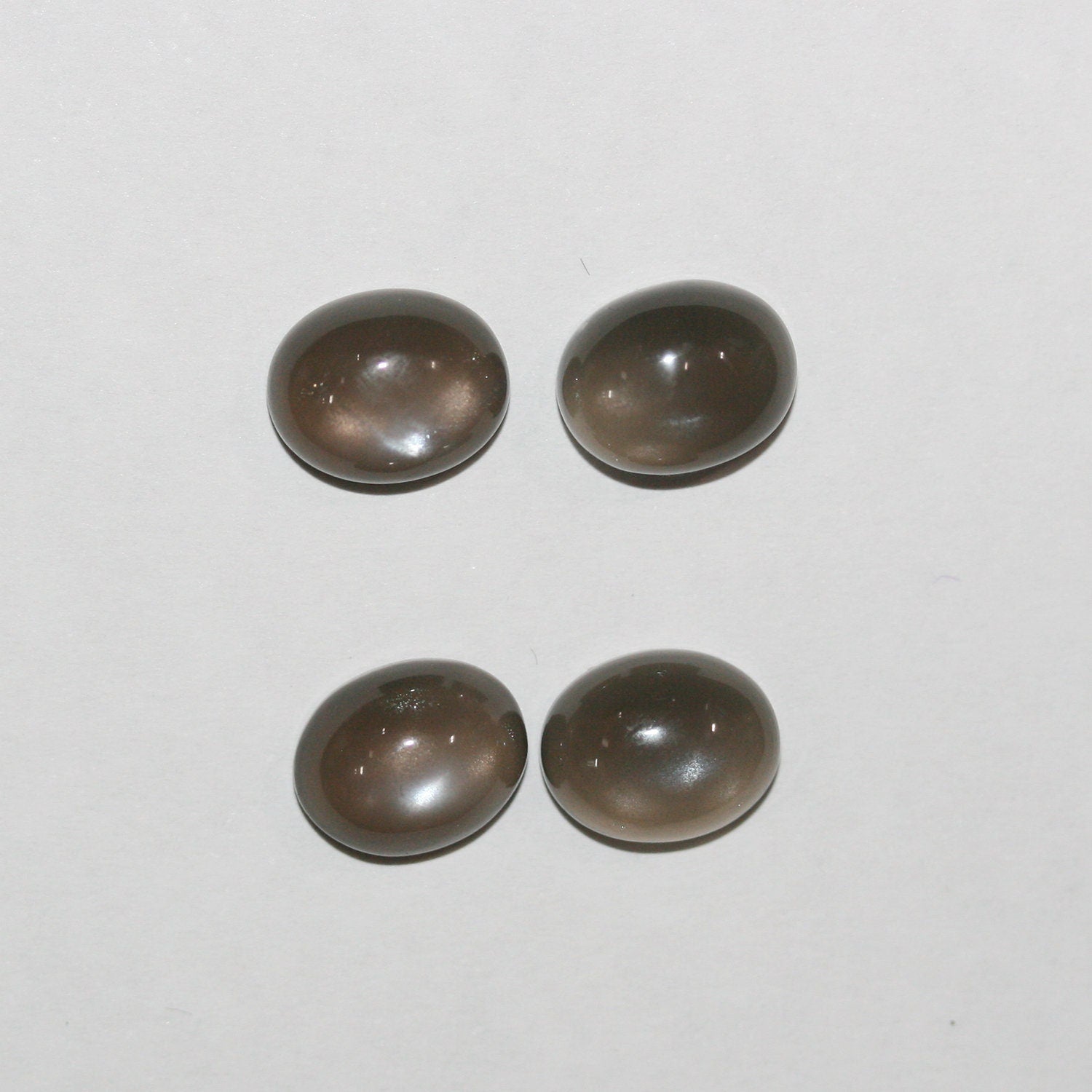 Lote de 4 cabujones ovalados de piedra lunar gris de 10 x 8 mm (4 piezas).