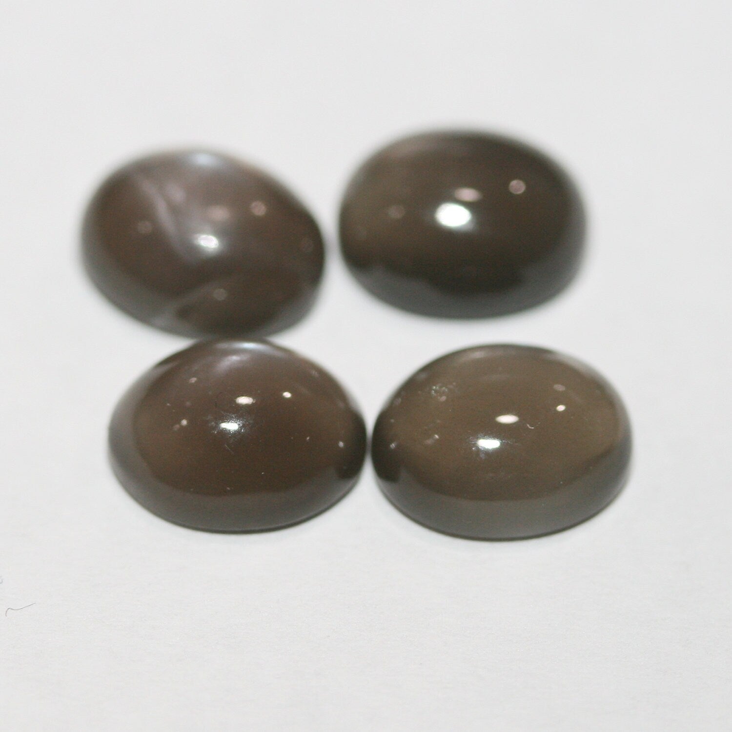 Lote de 4 cabujones ovalados de piedra lunar gris de 10 x 8 mm (4 piezas).