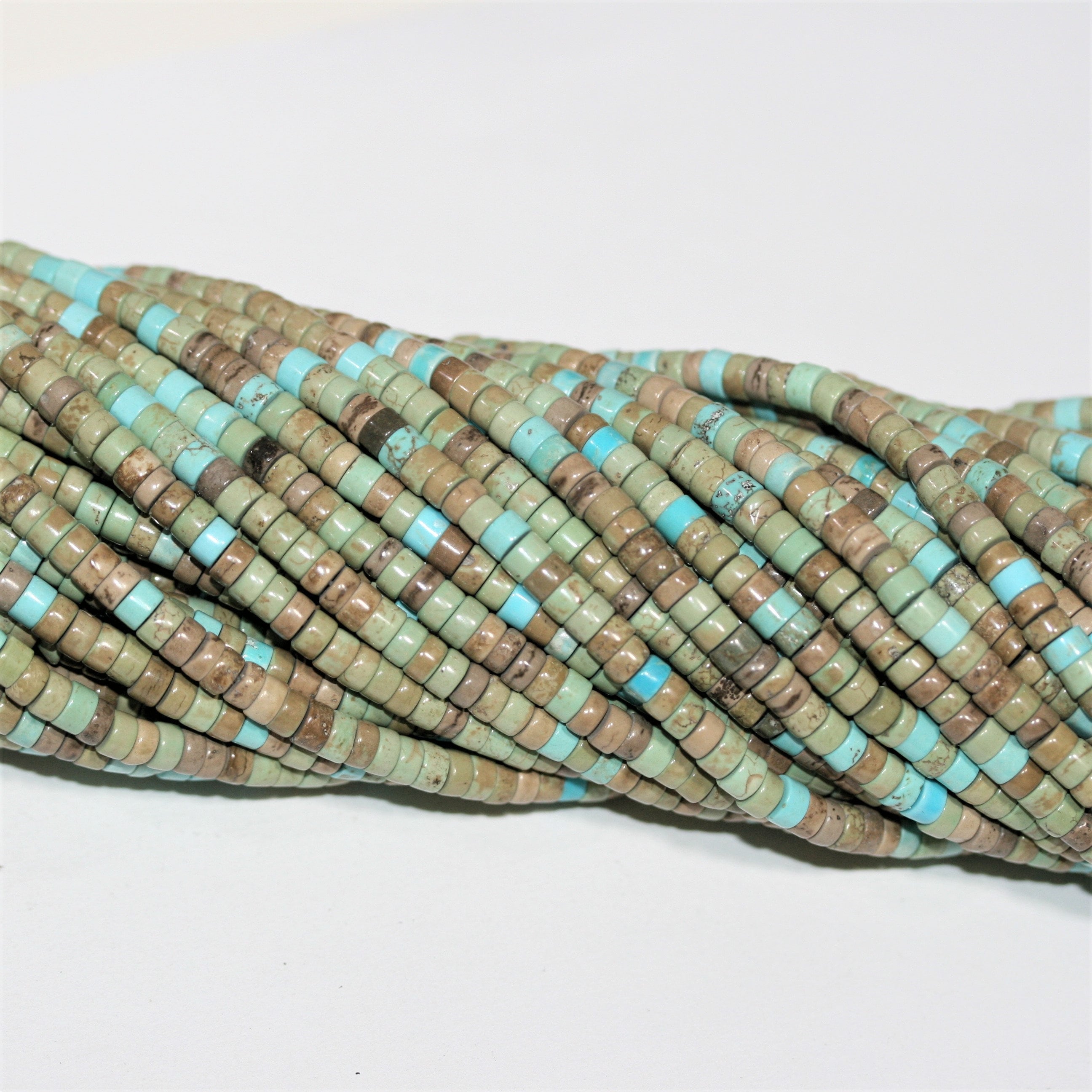 Perles rondelles lisses en turquoise St. 15" 4x2mm.- Brin 38cm.