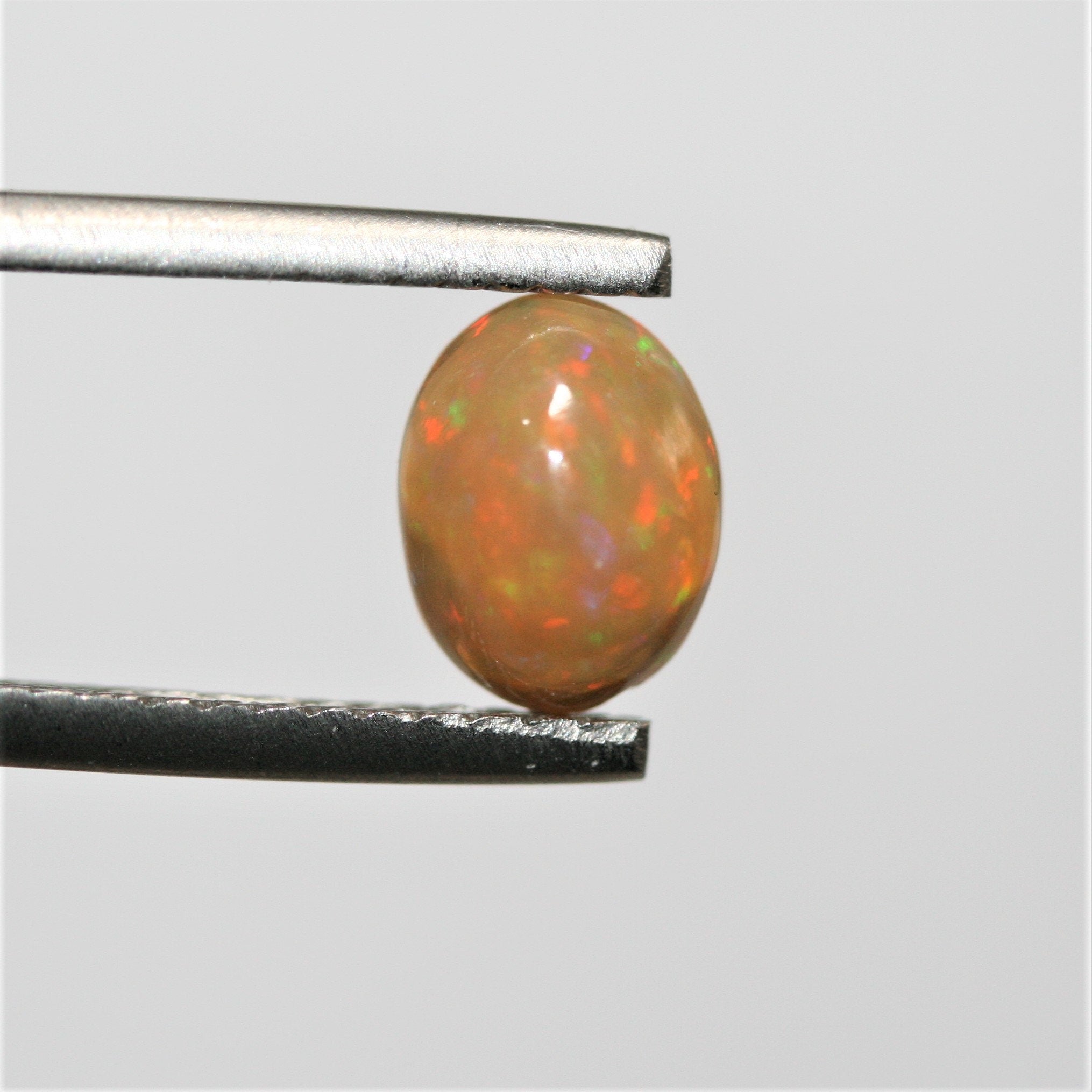 Ethiopian Opal Smooth Oval Cabochon 8x6mm. (2.9 ct.)