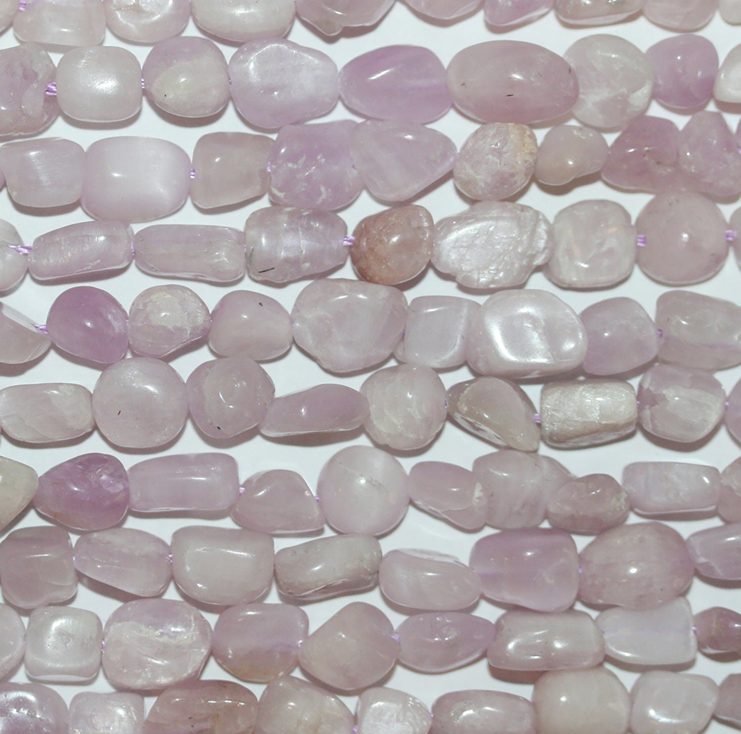 Perles de kunzite lisses en pépites de 8 à 10 mm, 15 pouces (39 cm) de long.