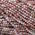 Perles rondes lisses en rhodonite de 15 pouces (2 mm). Longueur : 39 cm.