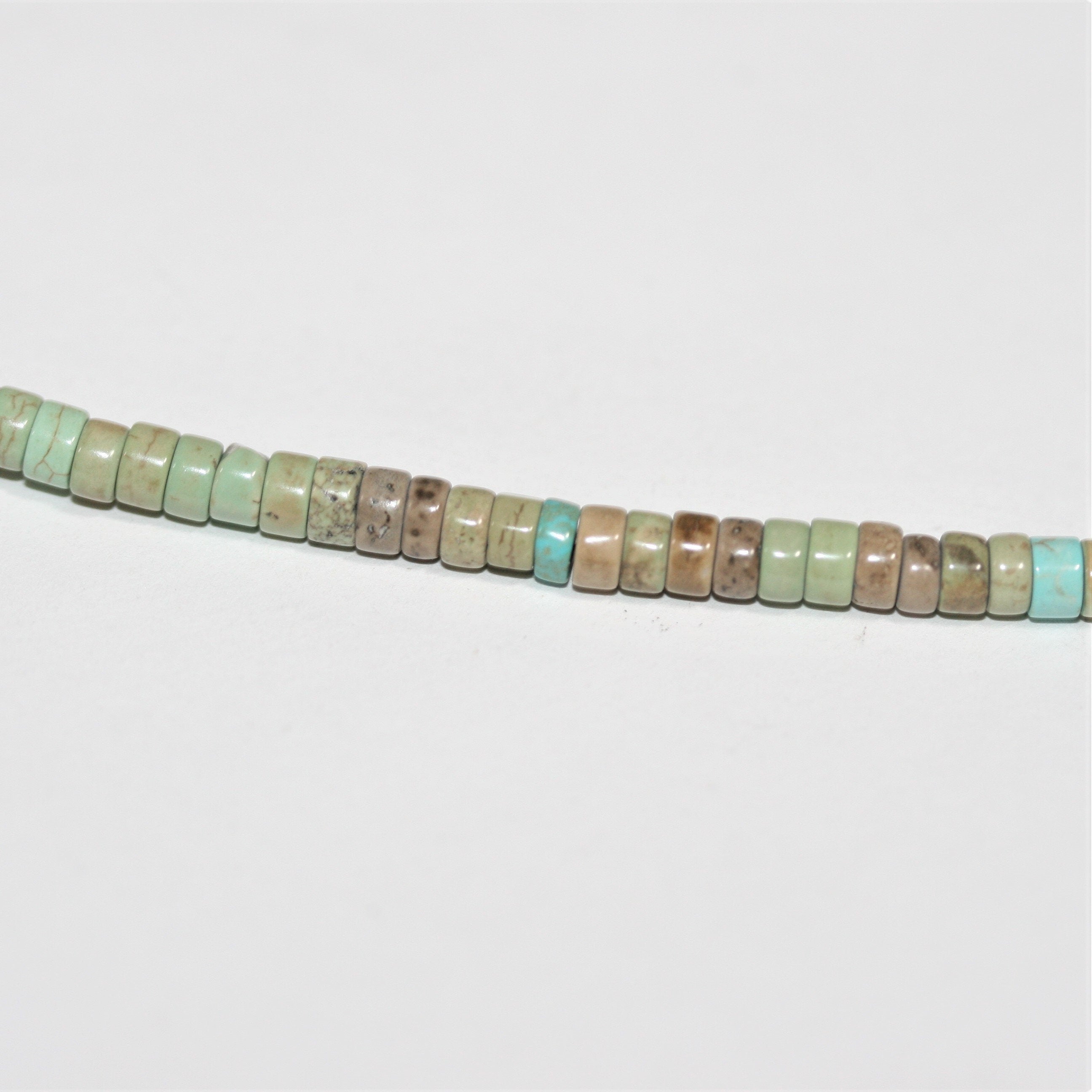 Perles rondelles lisses en turquoise St. 15" 4x2mm.- Brin 38cm.