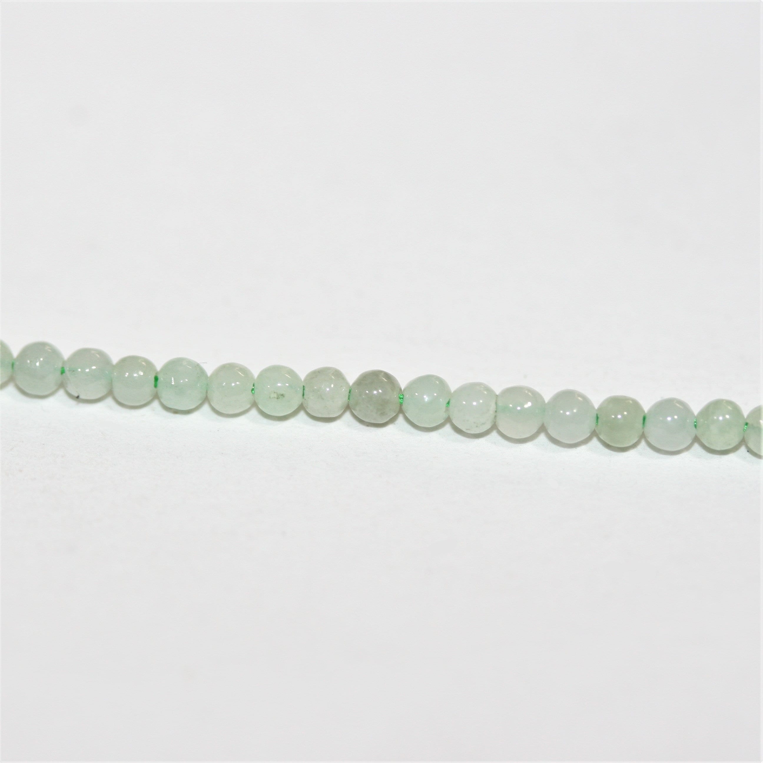 Cuentas redondas lisas de jade de Santa Birmania de 16", 2 mm - Hilo de 40 cm.