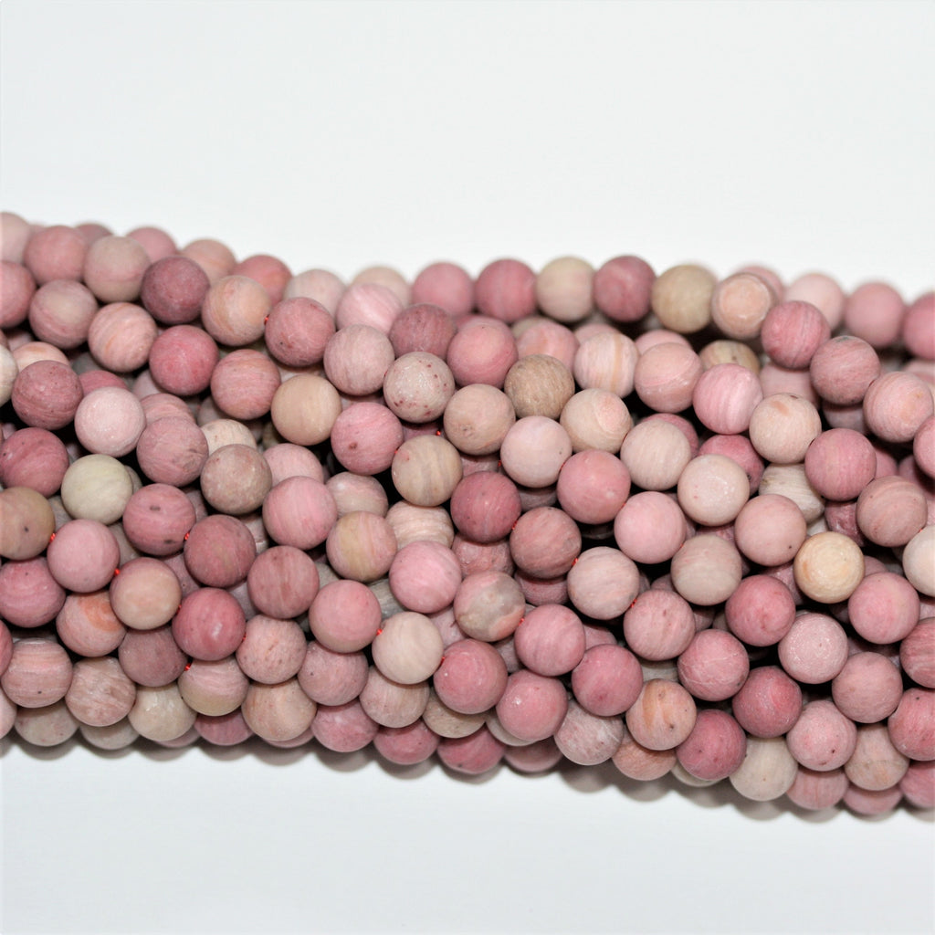 Perles rondes lisses en rhodonite mate 6 mm - Fil de 39 cm.