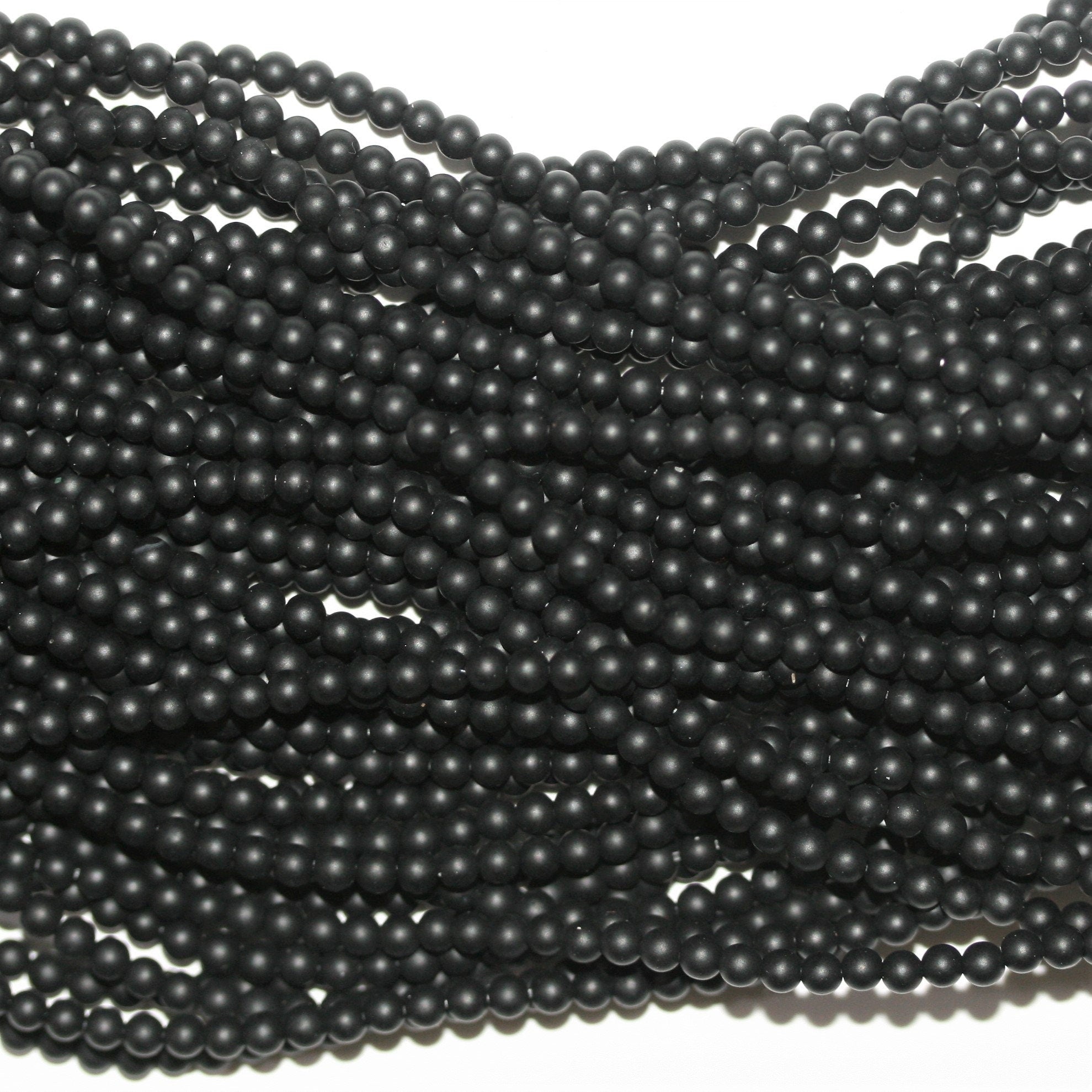 Perles rondes en onyx mat lisse 3 mm - Fil de 40 cm.