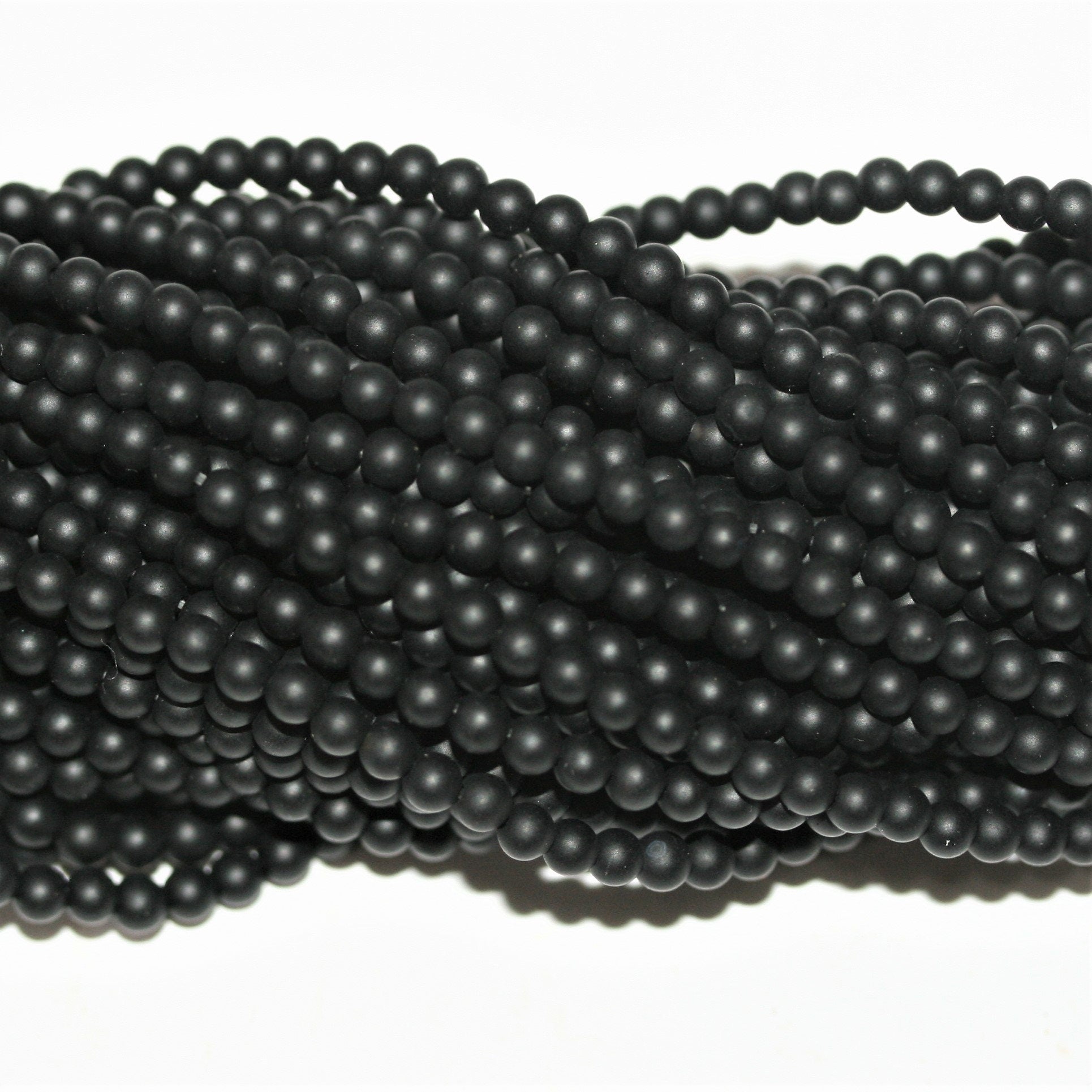 Perles rondes en onyx mat lisse 3 mm - Fil de 40 cm.