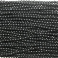 Perles rondes lisses en onyx finition mate 2 mm - Fil de 40 cm.