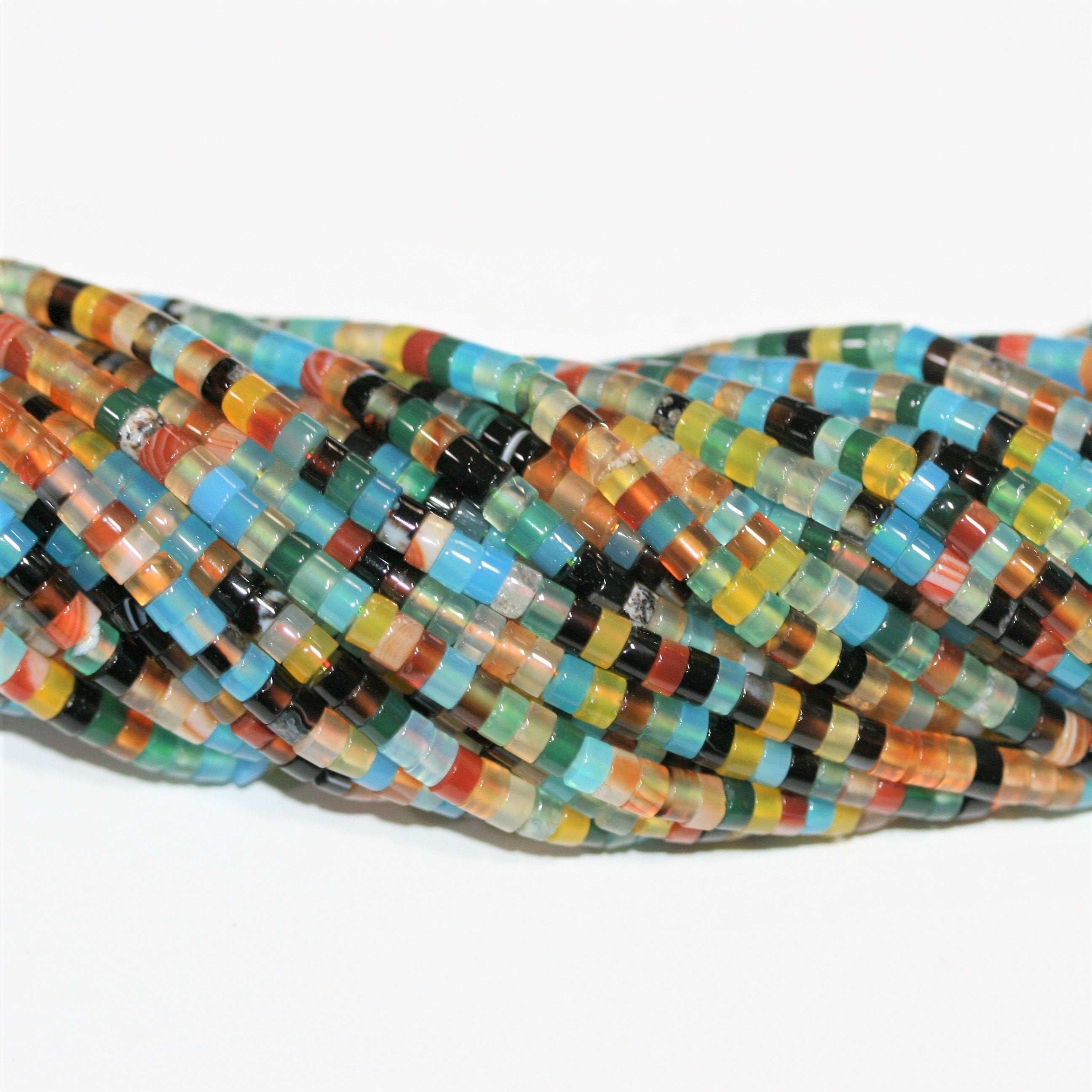 Perles disques lisses en pierre multicolore 15" 4x2mm.- Brin 39cm.