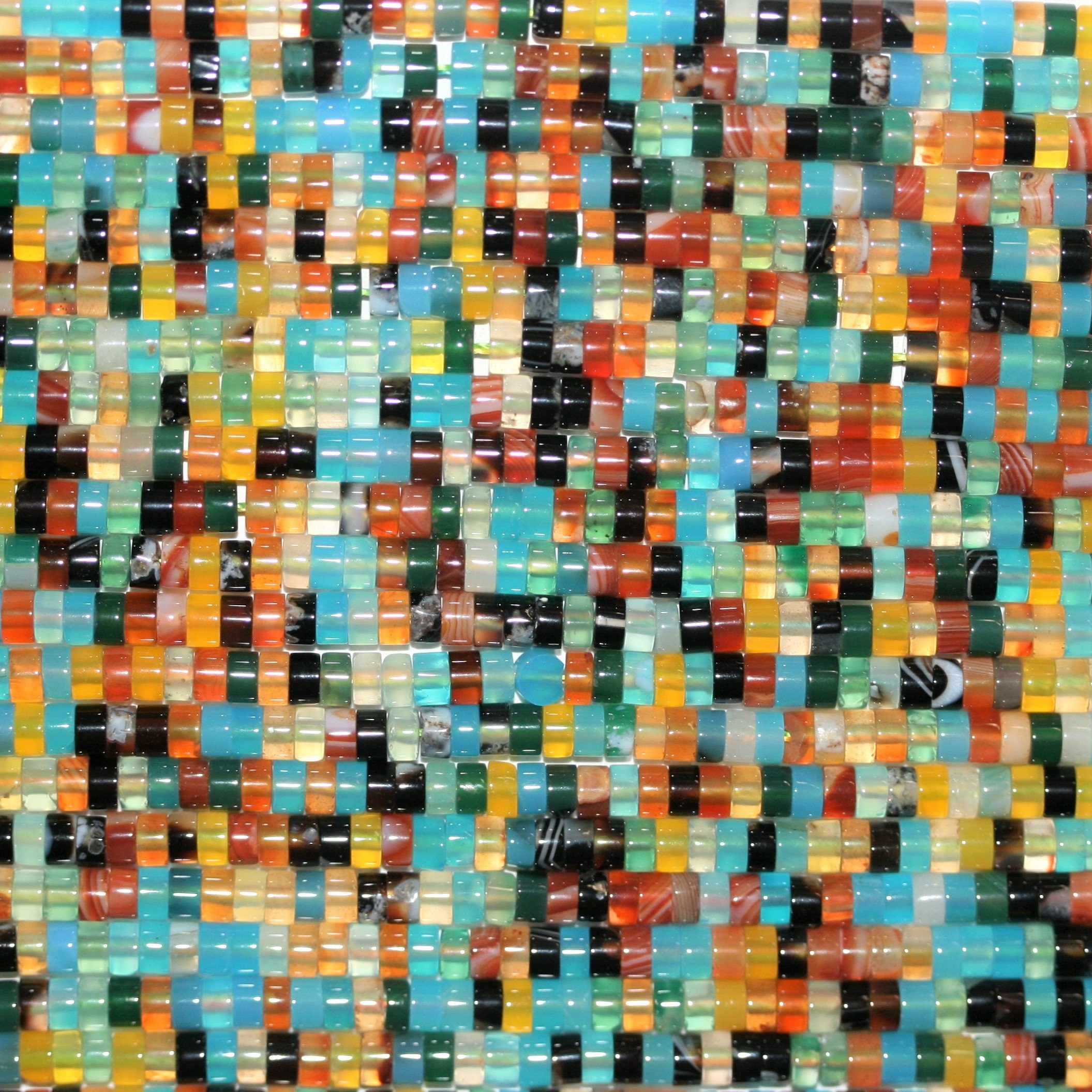 Perles disques lisses en pierre multicolore 15" 4x2mm.- Brin 39cm.