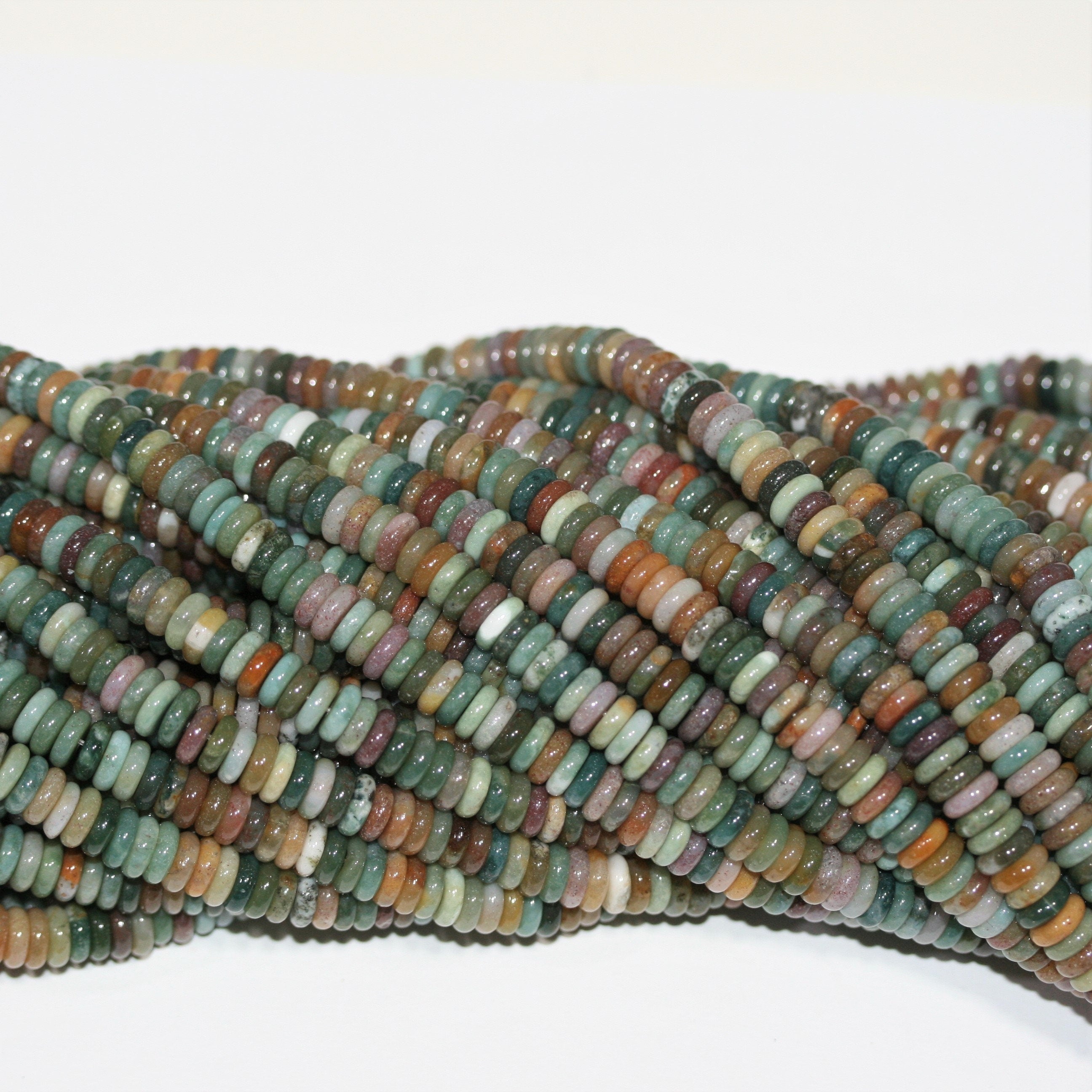 Perles rondelles lisses en agate indienne St 15" 6x2mm.- Brin 39cm.