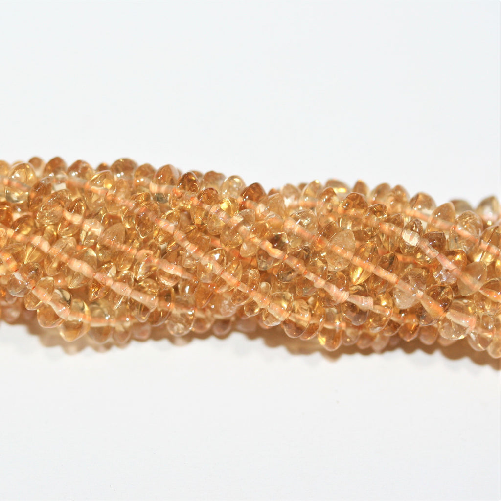 Perles rondelles lisses de citrine 4x2mm - Fil de 40cm.