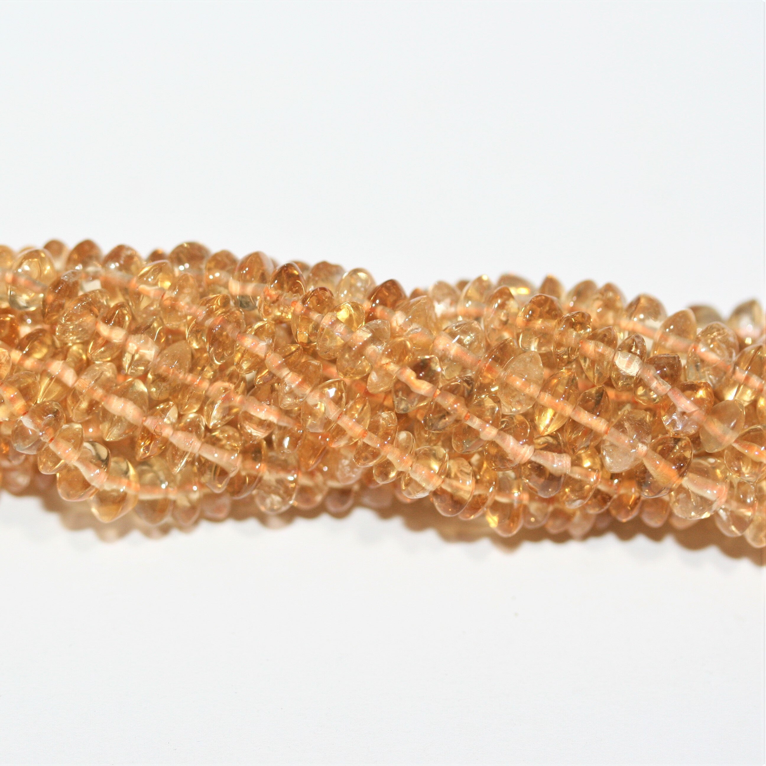 Perles rondelles lisses de citrine 4x2mm - Fil de 40cm.