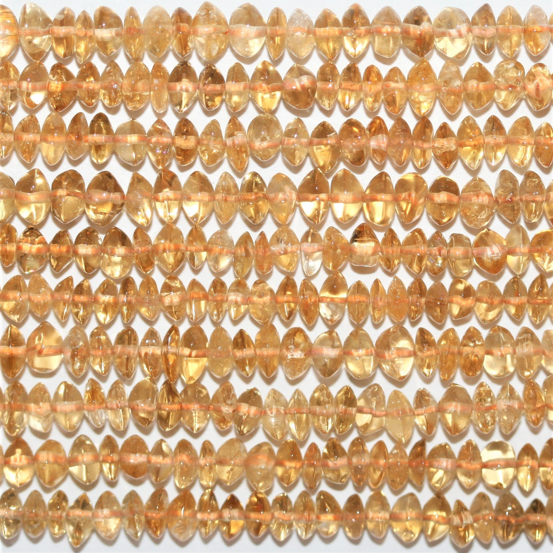Perles rondelles lisses de citrine 4x2mm - Fil de 40cm.