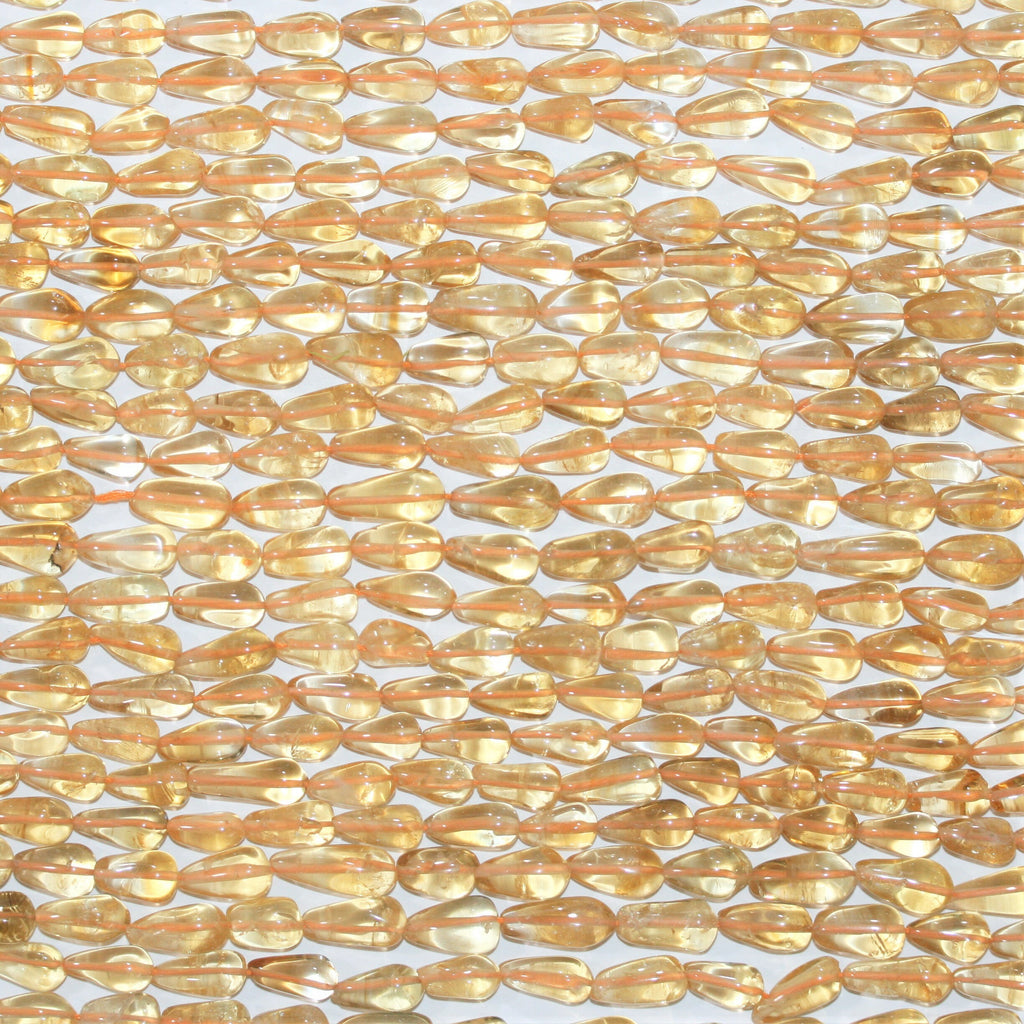 14" St Citrine Smooth Drop Beads 11x5mm. Approx.- Strand 37cm.