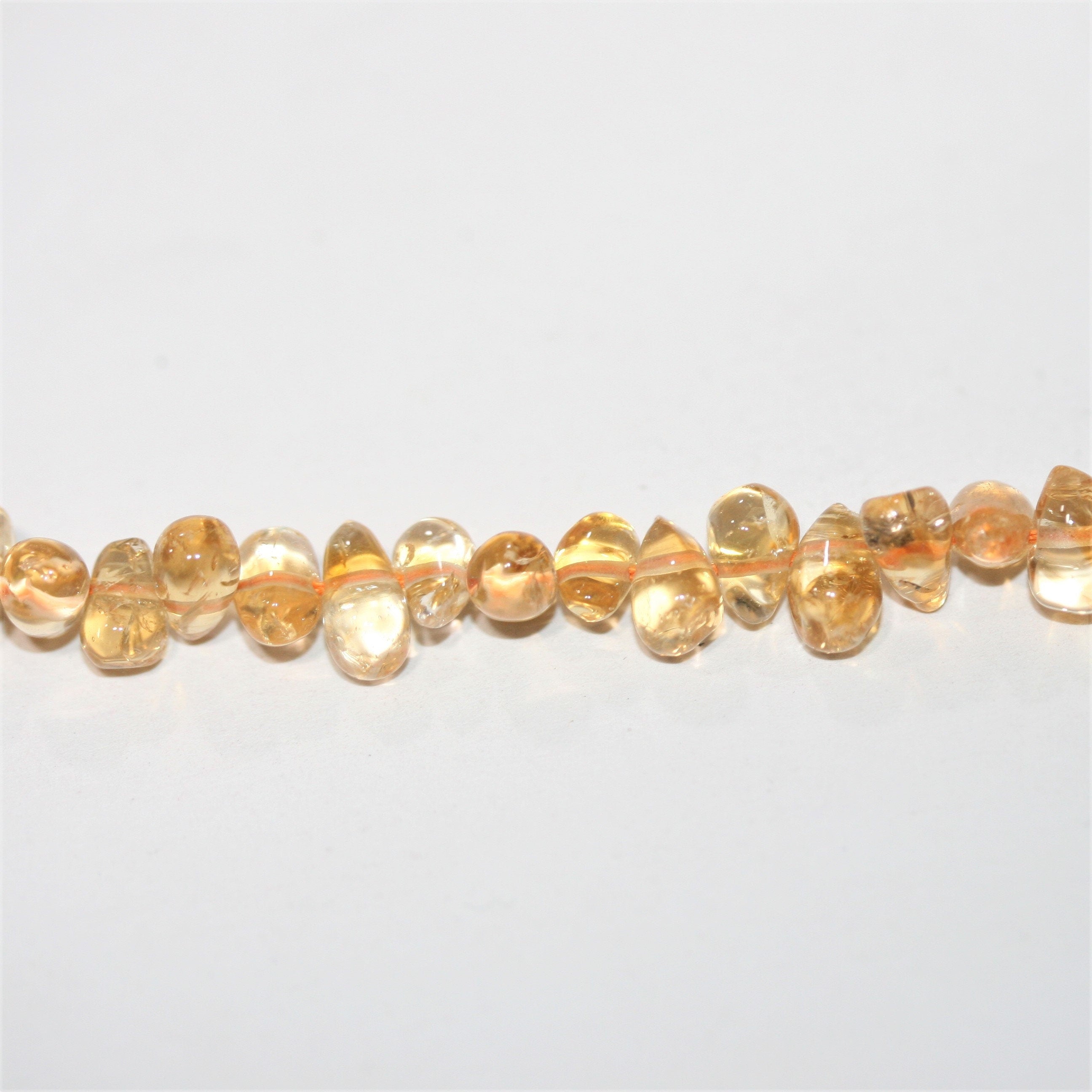 14" St Citrine Smooth Drop Beads 8x5mm. Approx.- Strand 36cm.