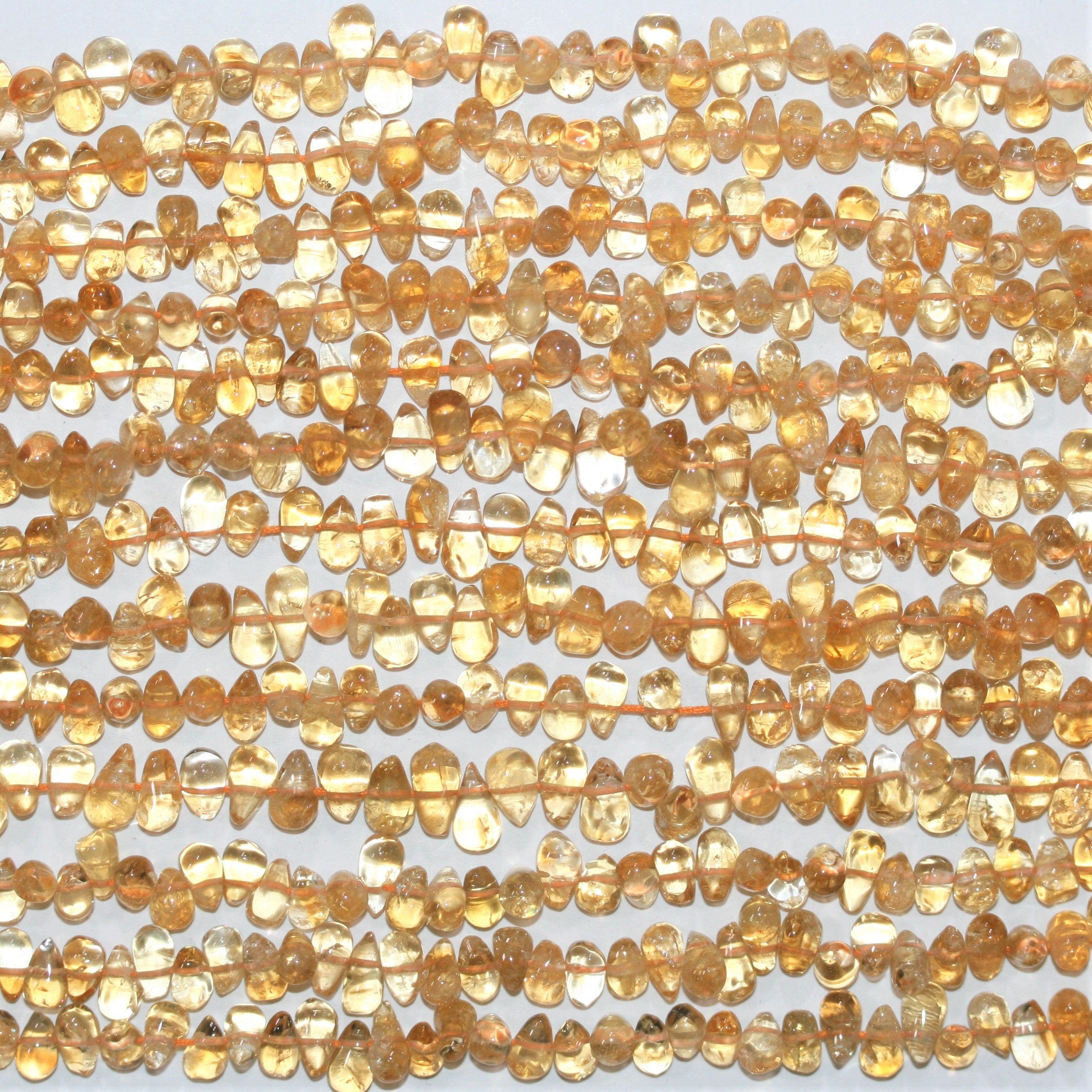 14" St Citrine Smooth Drop Beads 8x5mm. Approx.- Strand 36cm.