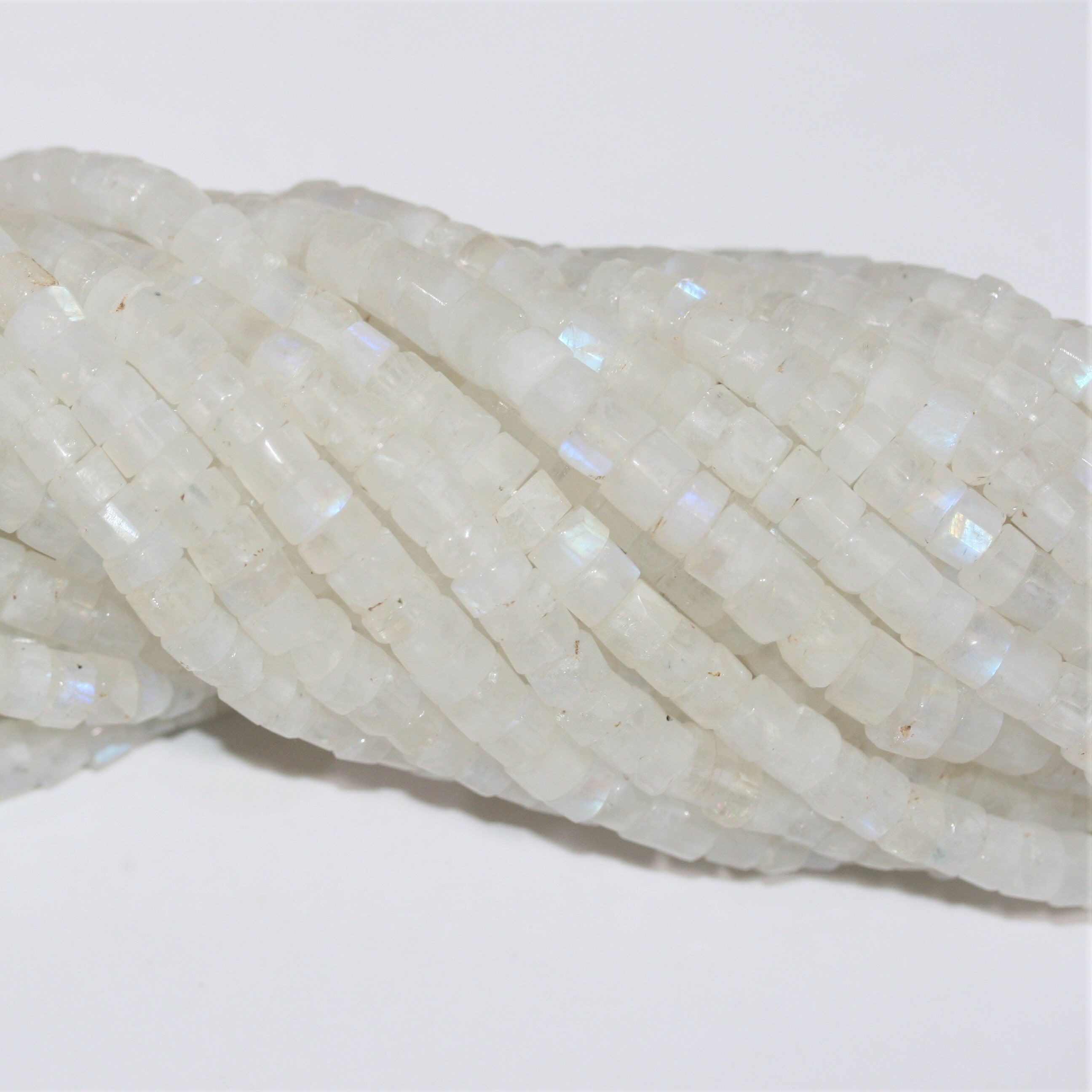 14" St Moonstone Faceted Disc Beads 6x4mm.- Strand 36cm.
