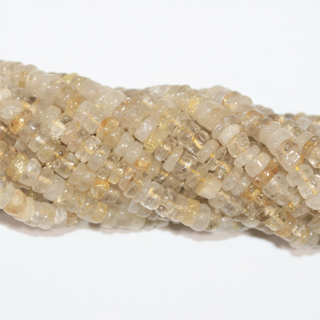 Perles de quartz rutile lisses en forme de disque de 14 pouces (6 x 3 mm). Longueur approximative du brin : 35 cm.