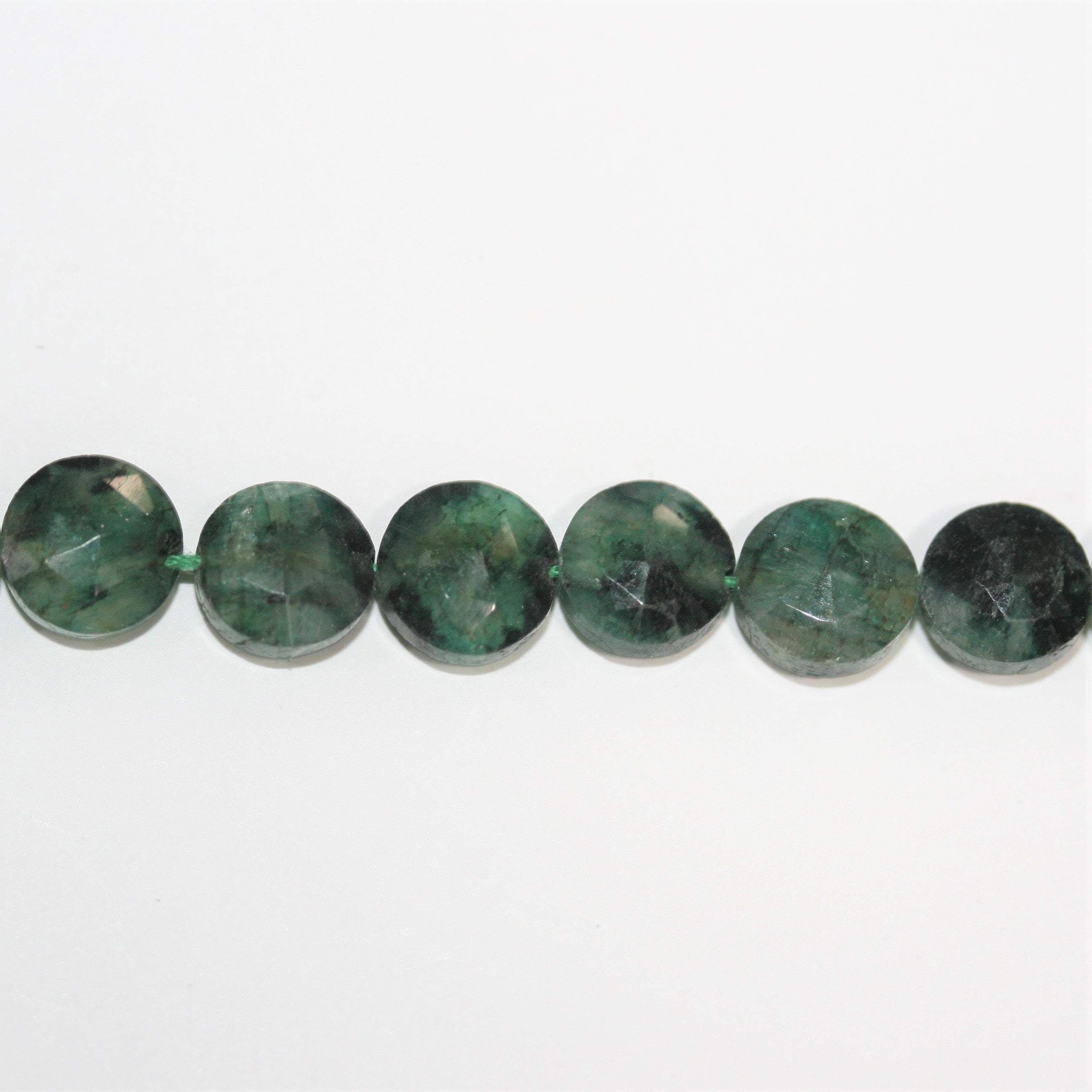 10" St Emerald Faceted Coin Beads 7- 7.5mm.- Strand 26cm.