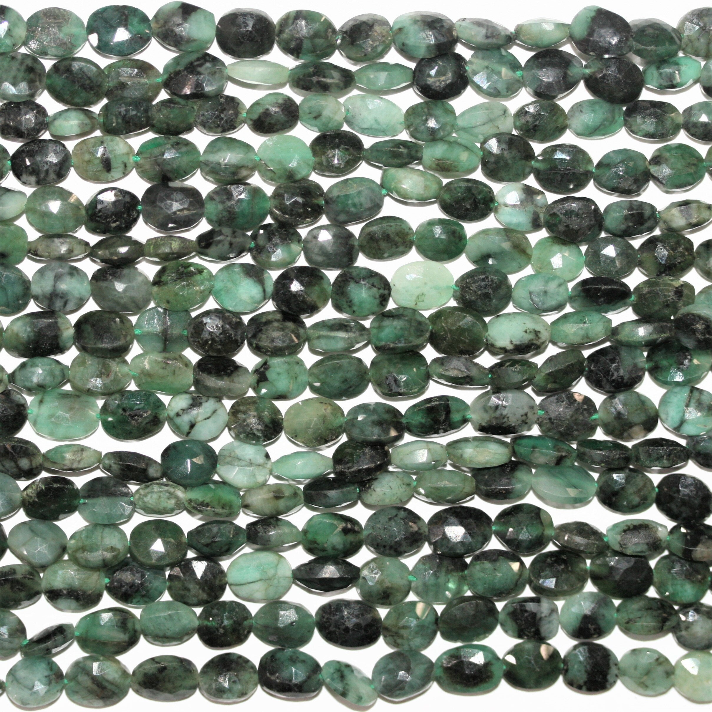 12" St Faceted Oval Emerald Beads 8x6mm.- Strand 30cm.