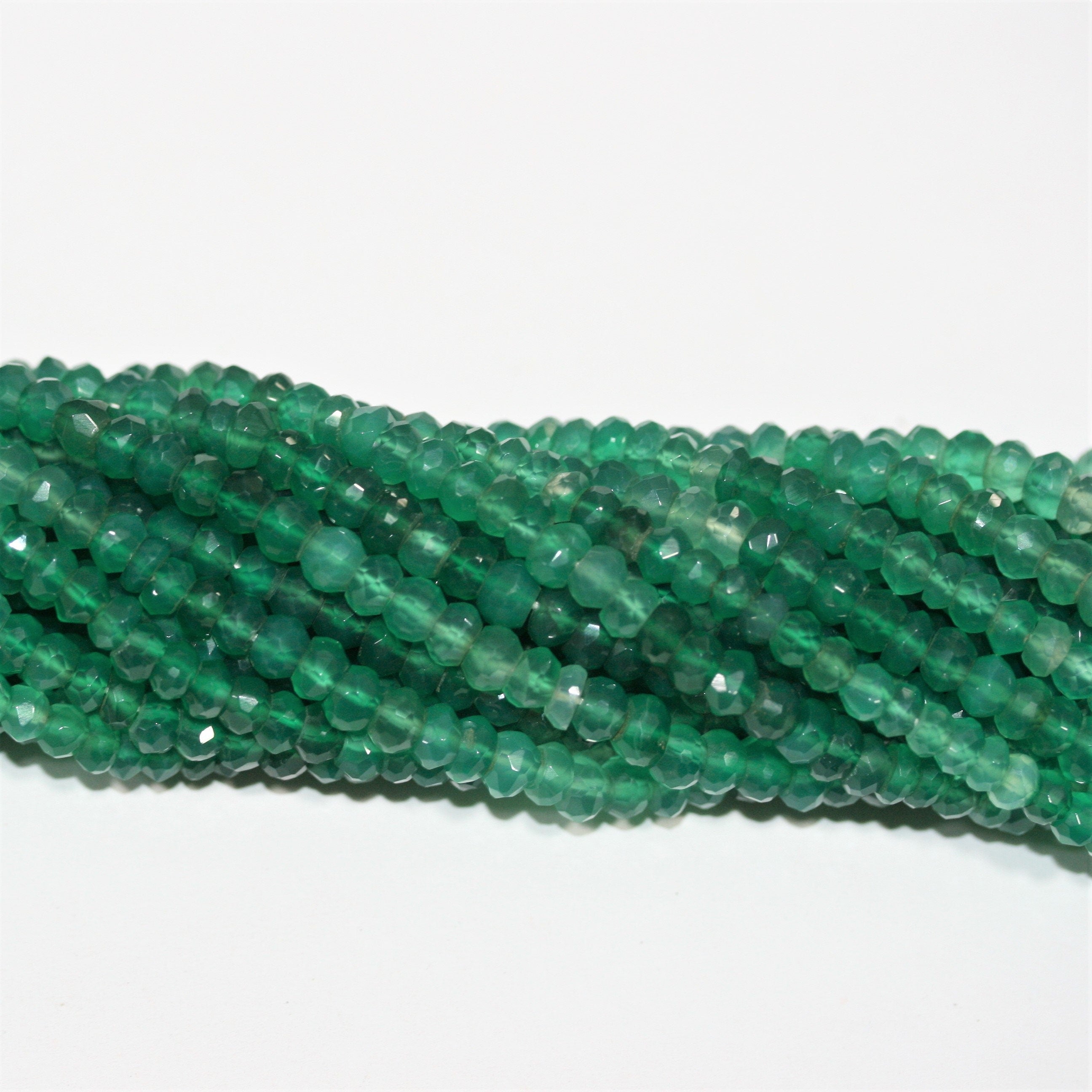 13" St Green Onyx Faceted Rondelle Beads 5x3mm.- Strand 33cm.