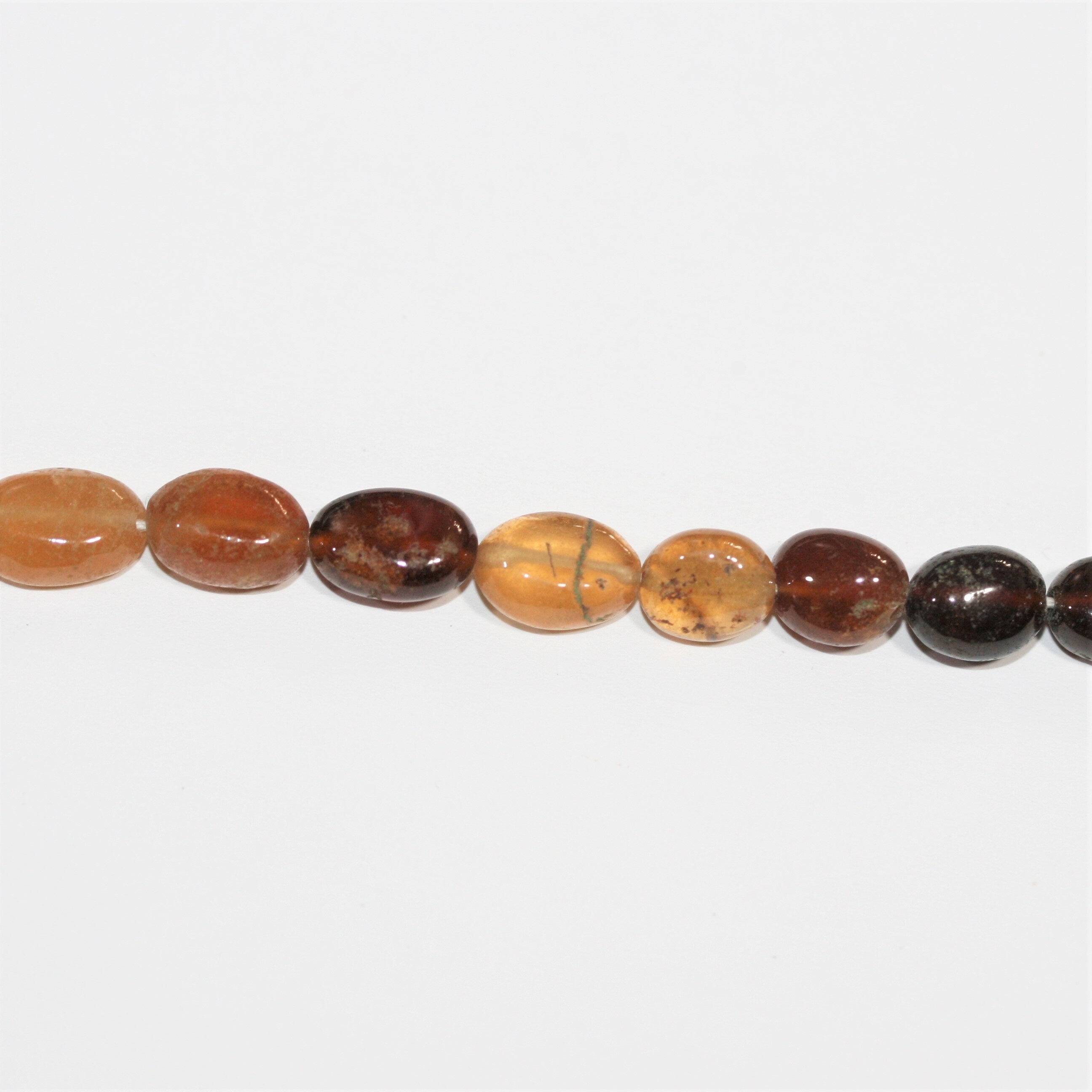 13" St Hesonite Garnet Smooth Oval Beads 10x7mm. Approx.- Strand 33cm.