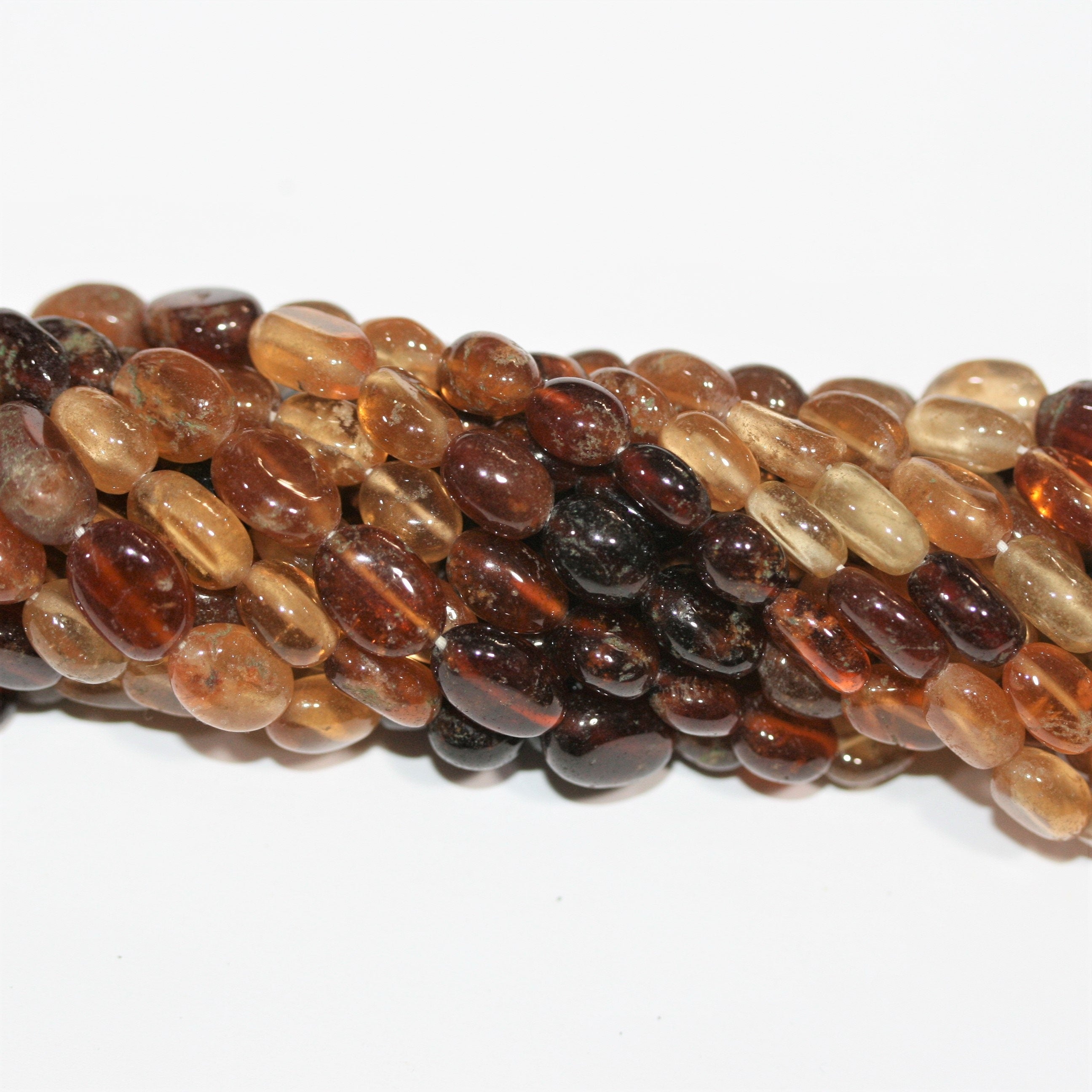 13" St Hesonite Garnet Smooth Oval Beads 10x7mm. Approx.- Strand 33cm.
