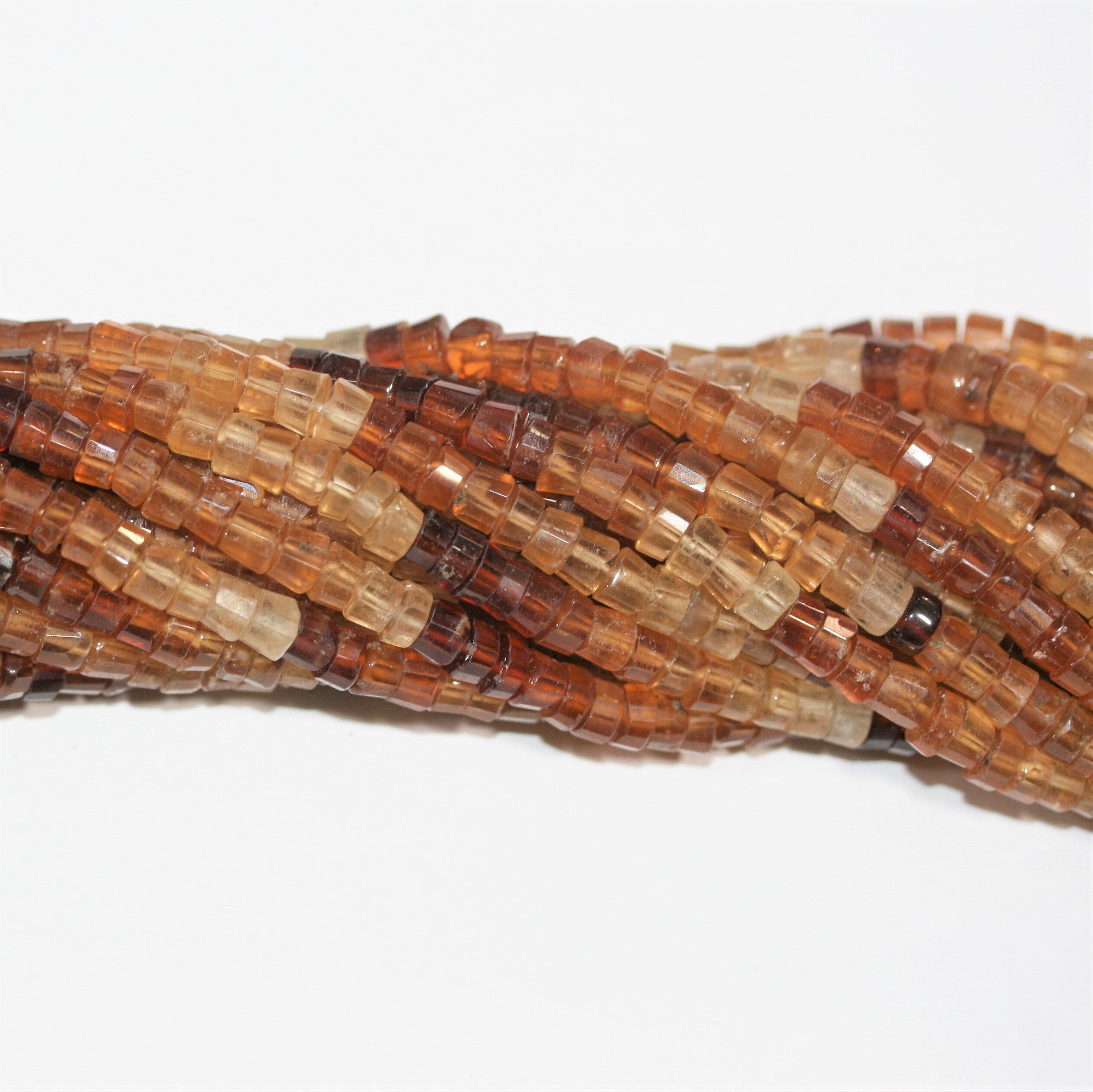 13" St Hesonite Garnet Faceted Disc Beads 5x3mm.- Strand 33cm.