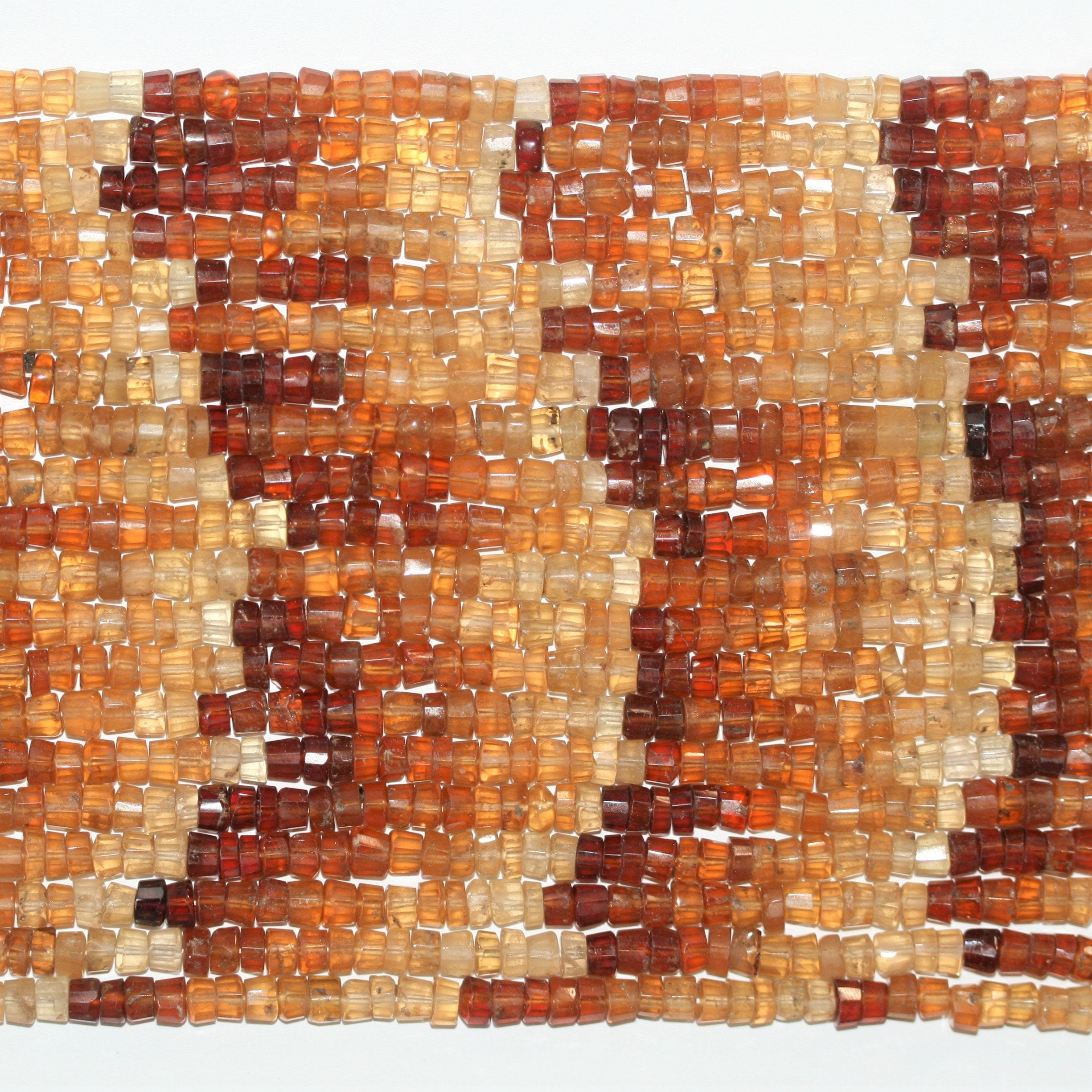 13" St Hesonite Garnet Faceted Disc Beads 5x3mm.- Strand 33cm.