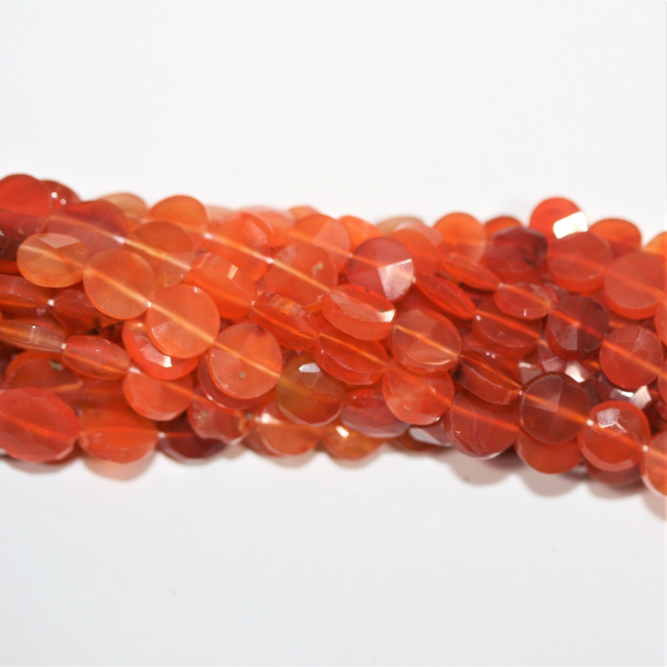 13" St Carnelian Faceted Coin Beads 7mm. Approx.- Strand 33cm.