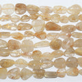 13" St Rutilated Quartz Smooth Nugget Beads 10-20mm. Approx.- Strand 33cm.