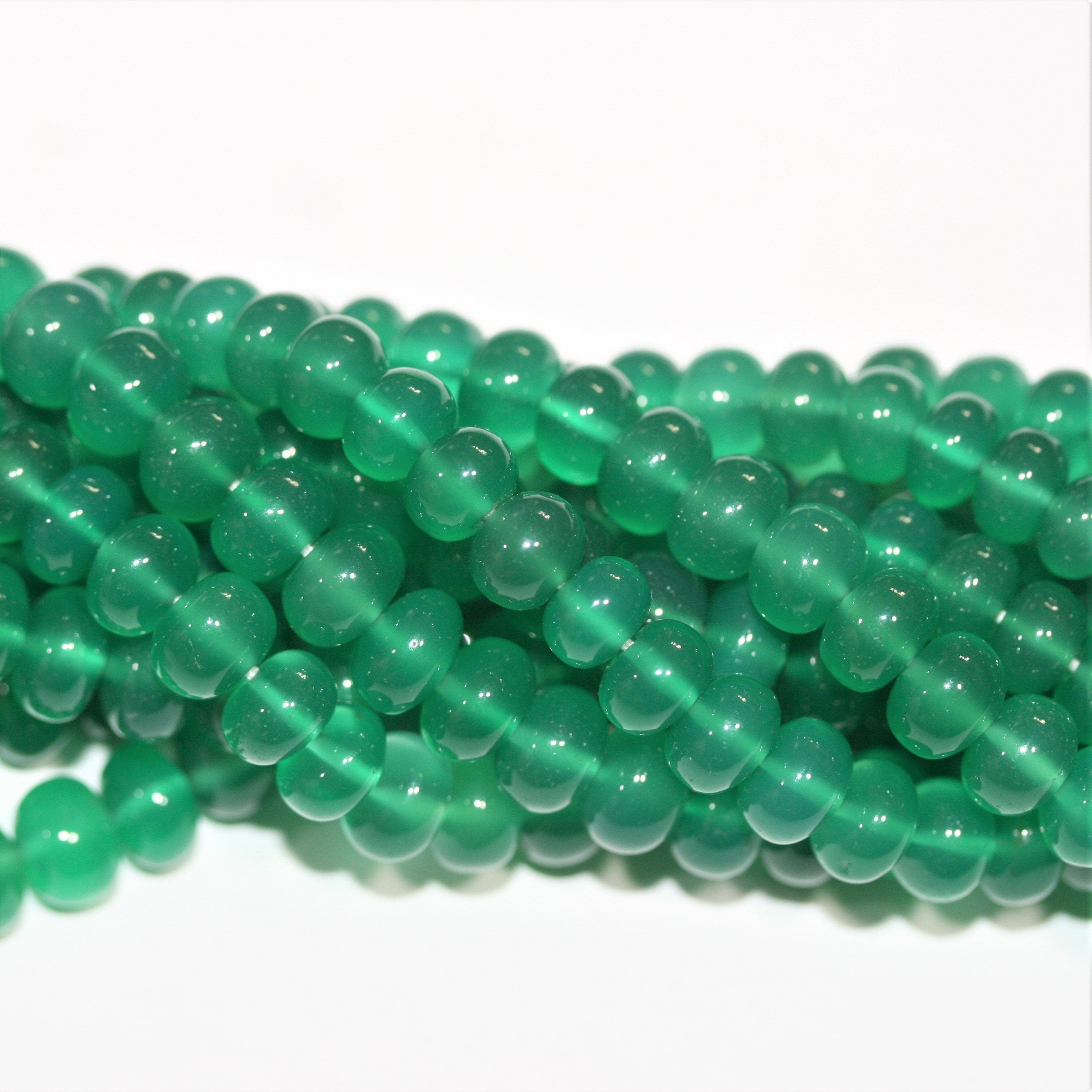 Cuentas redondas lisas de ónix verde San de 16" de 8 x 5 mm - Hilo de 40 cm.