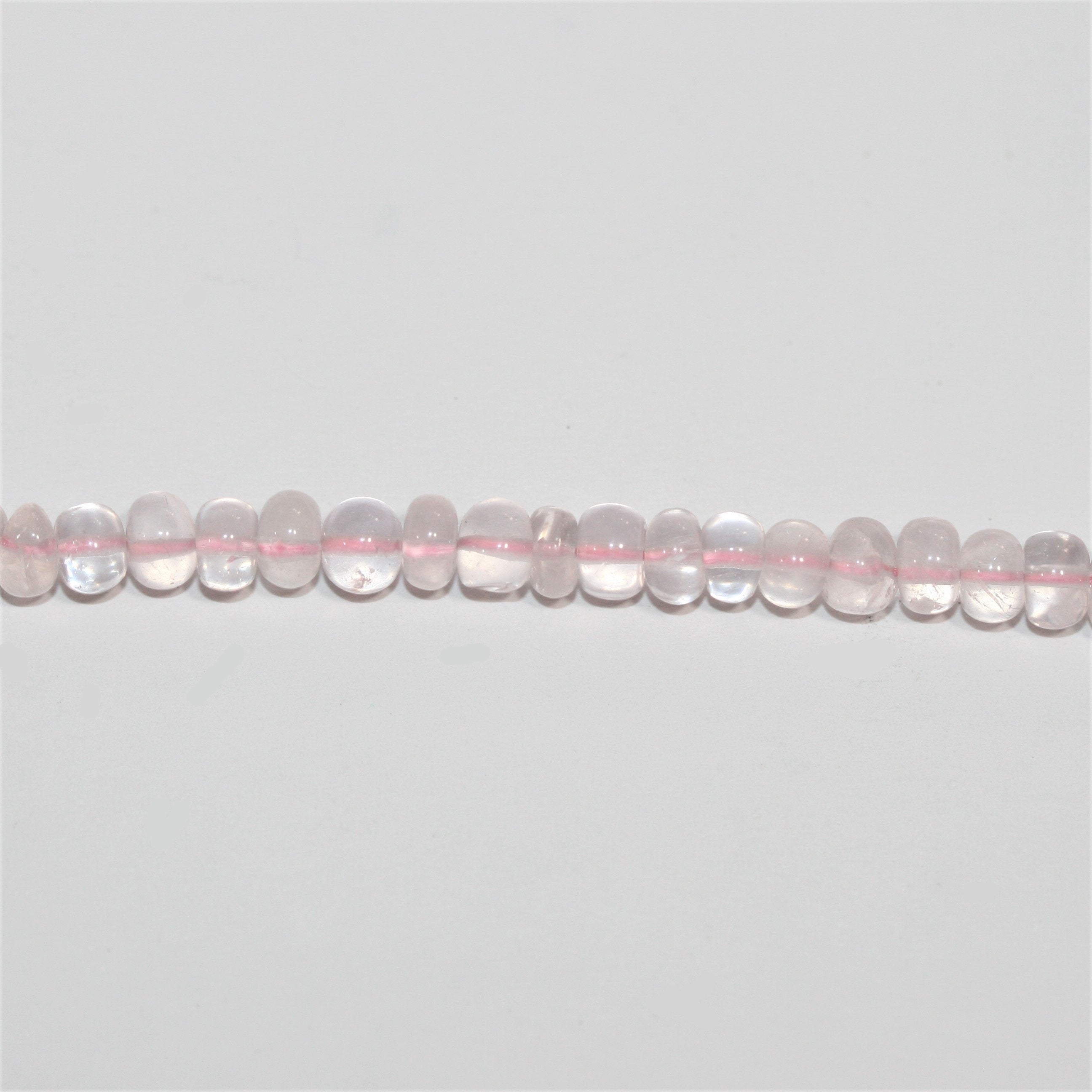 13" St Rose Quartz Smooth Rondelle Beads 5x3mm.- Strand 34cm.