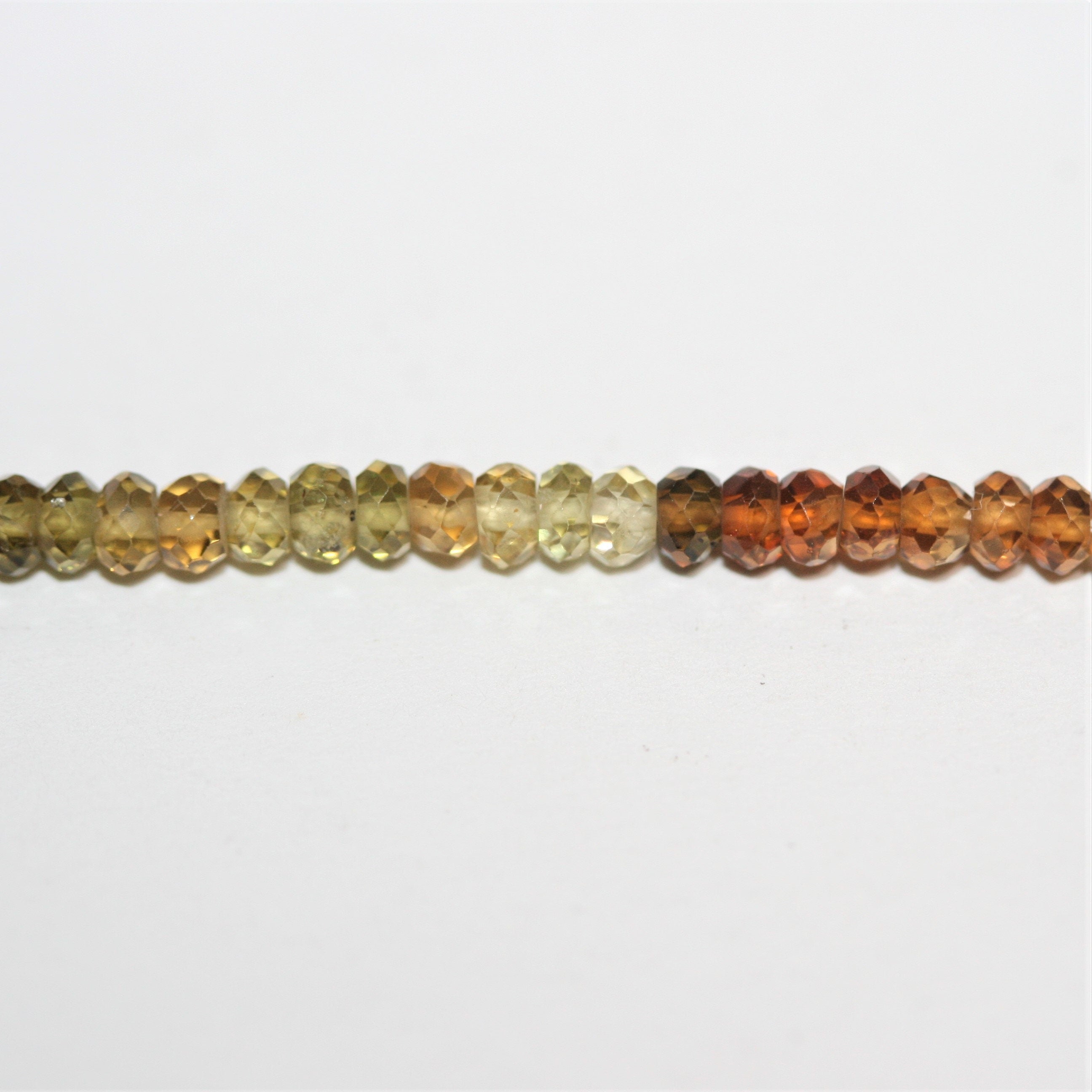 Perles rondelles à facettes en tourmaline St. Petrotourmaline 14" 3x2mm.- Brin 35cm.