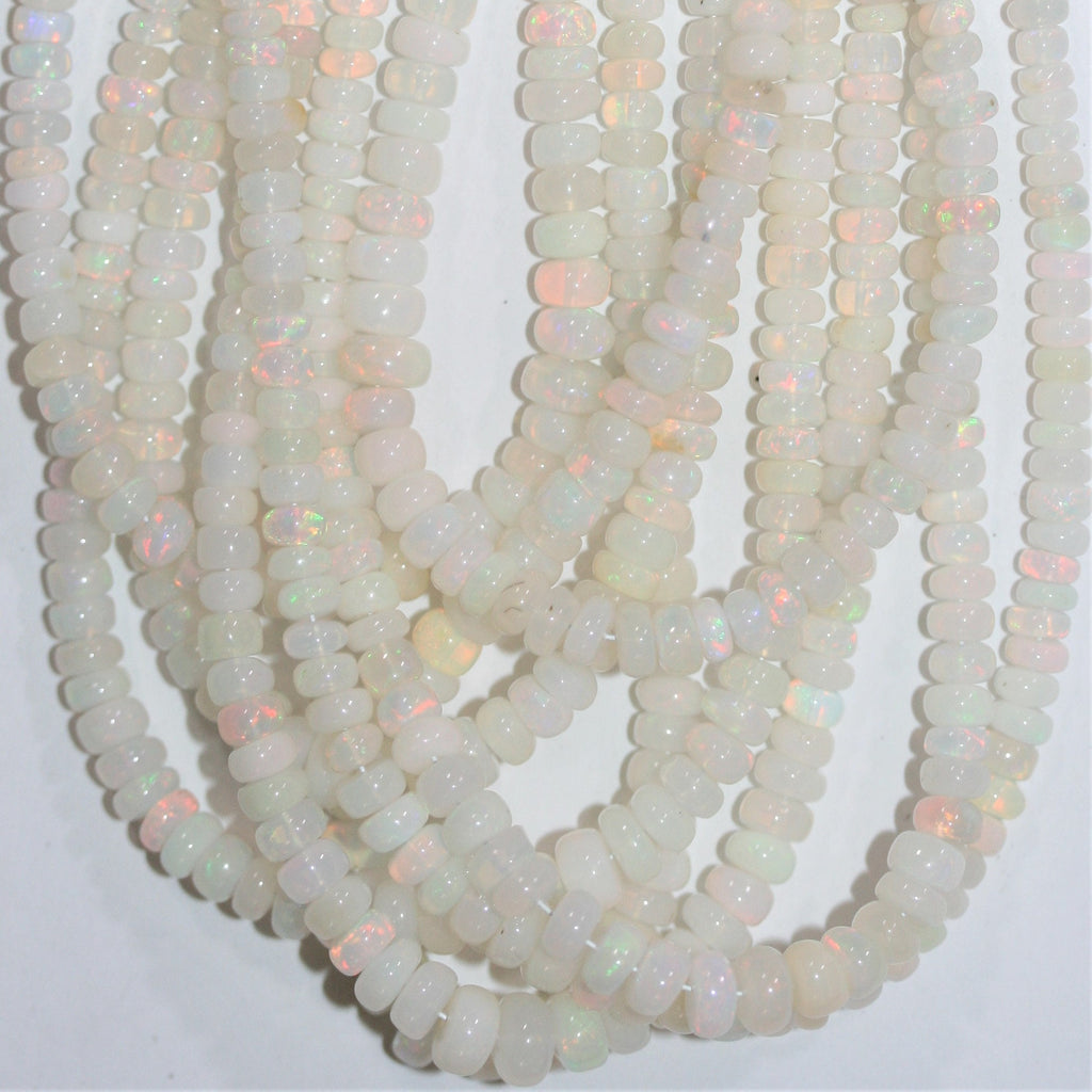 16" St Ethiopian Opal Graduated Smooth Rondelle Beads 3x2- 7x3.5mm.- Strand 40cm.- Item. 13252 - Hard Gems