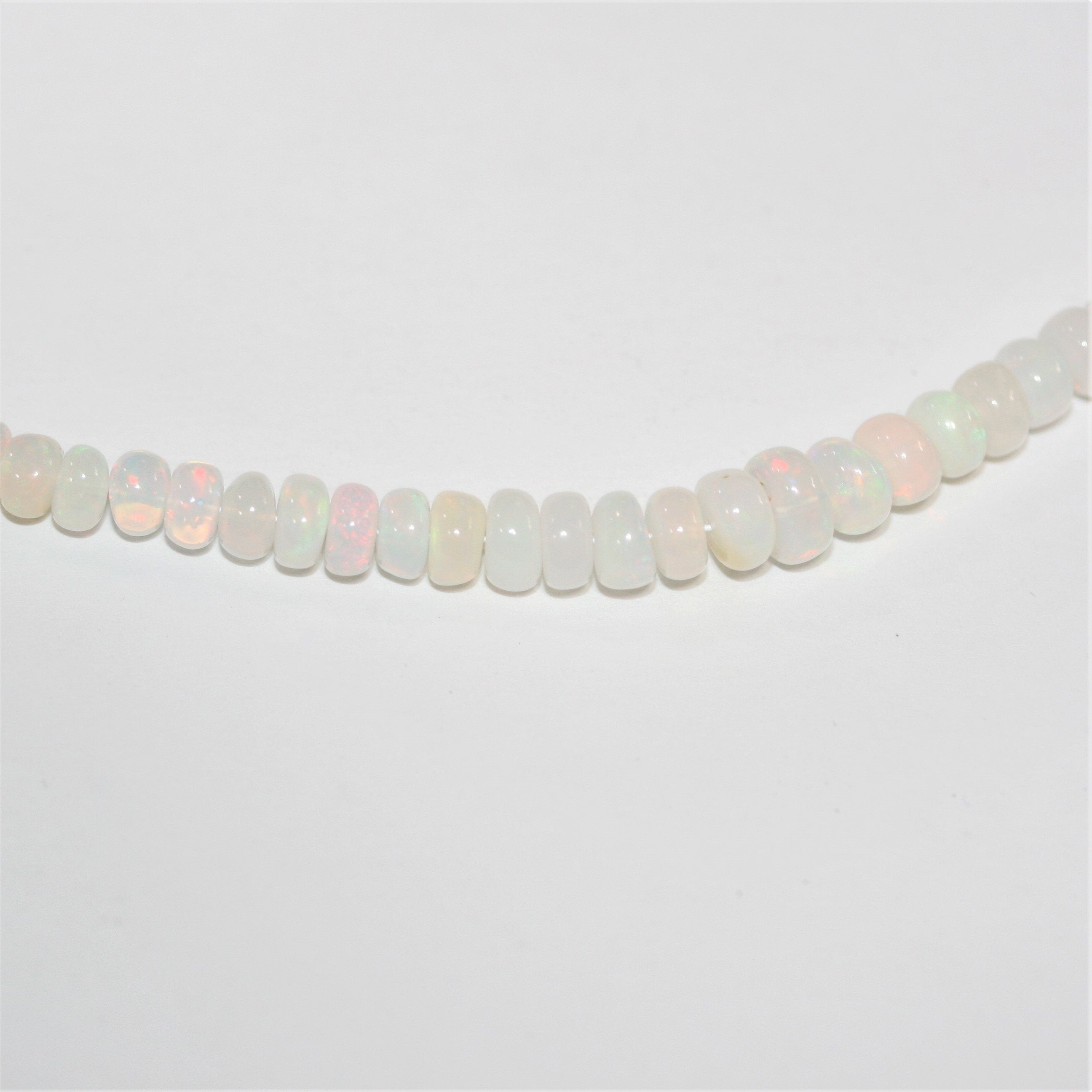 16" St Ethiopian Opal Graduated Smooth Rondelle Beads 3x2- 7x3.5mm.- Strand 40cm.- Item. 13252 - Hard Gems