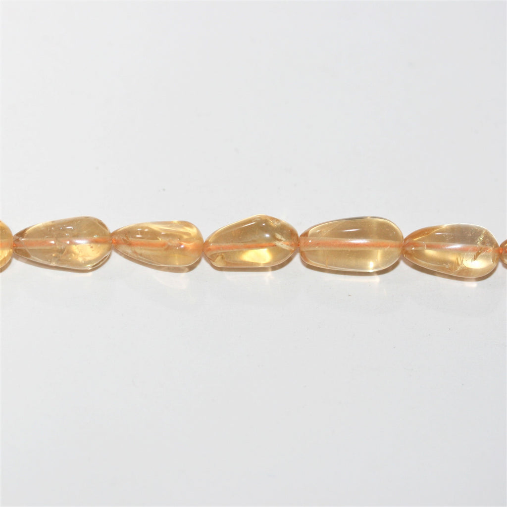 14" St Citrine Smooth Drop Beads 11x5mm. Approx.- Strand 37cm.