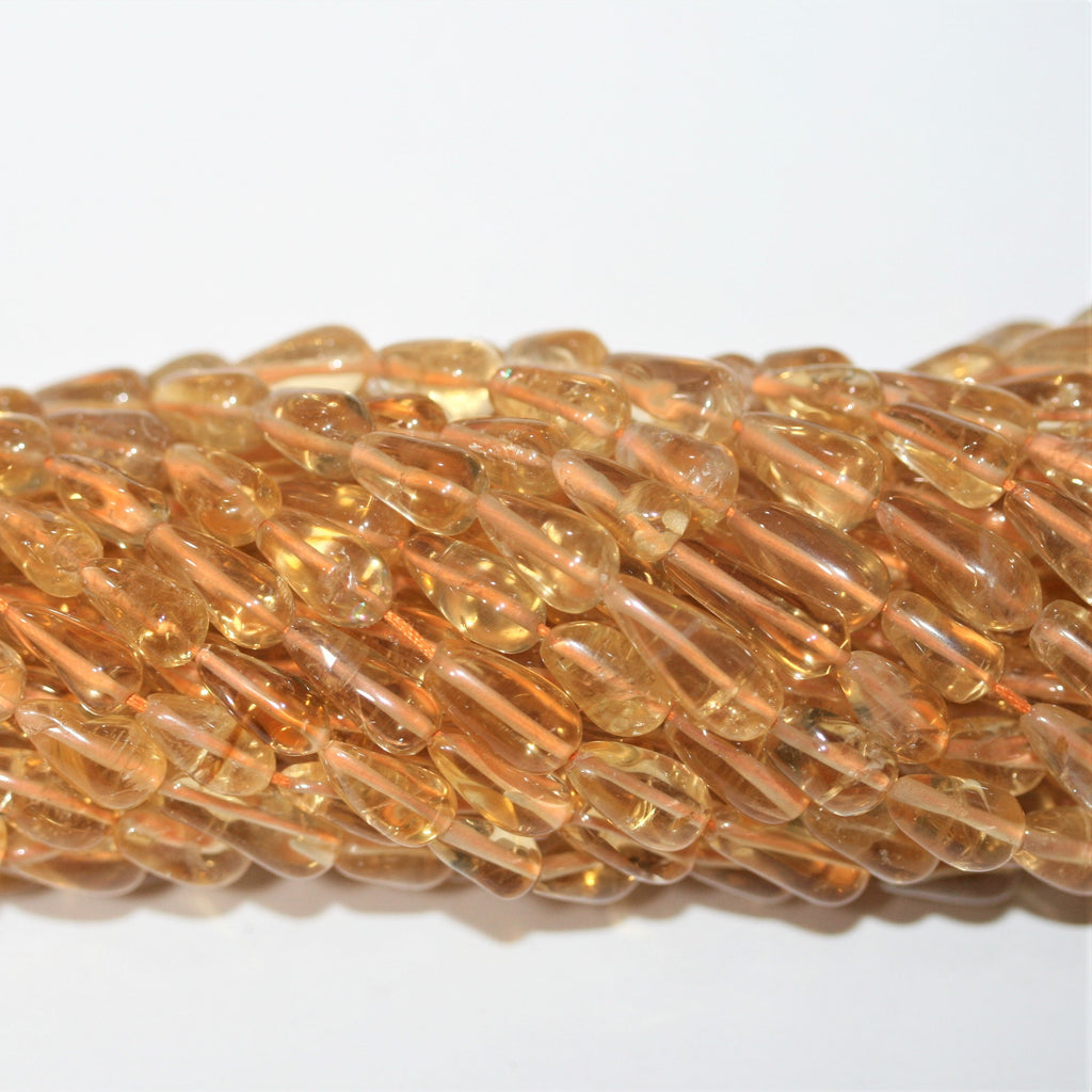 14" St Citrine Smooth Drop Beads 11x5mm. Approx.- Strand 37cm.