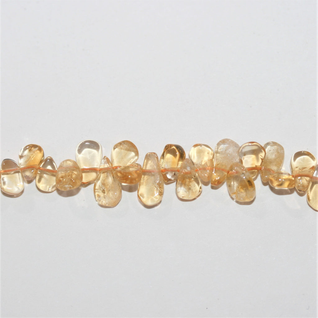Perles plates lisses en citrine St de 15 pouces (8 x 5 mm). Longueur approximative du brin : 38 cm.